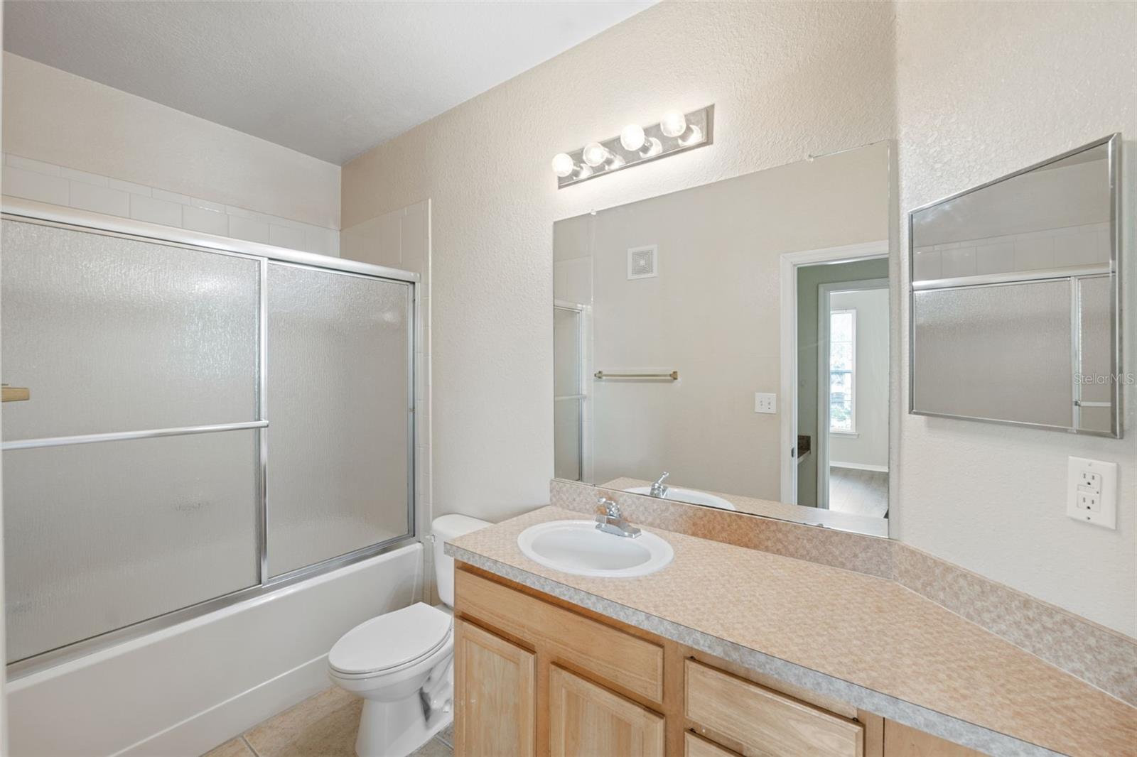 10209 COURTNEY PALMS BLVD #204