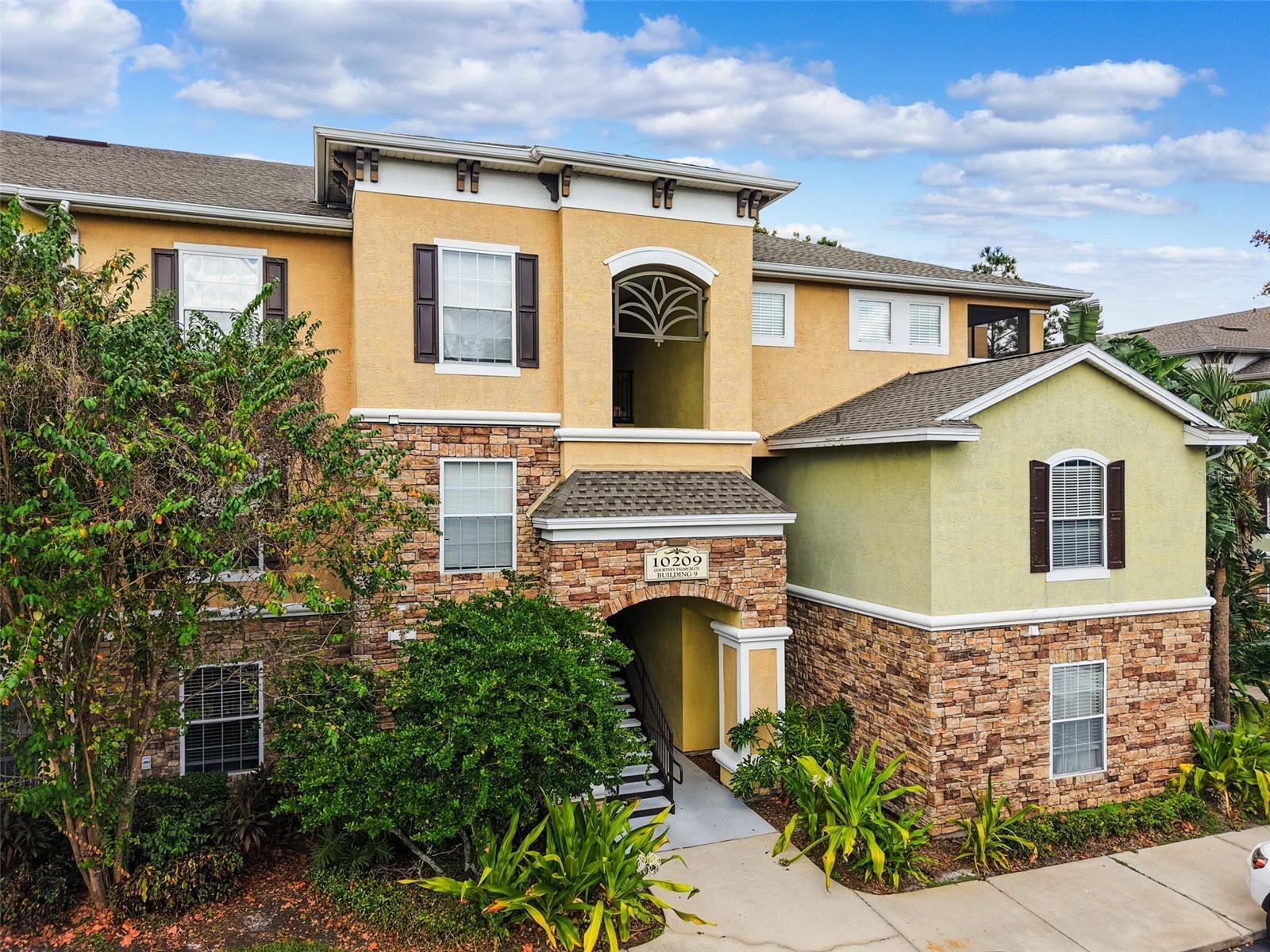 10209 COURTNEY PALMS BLVD #204