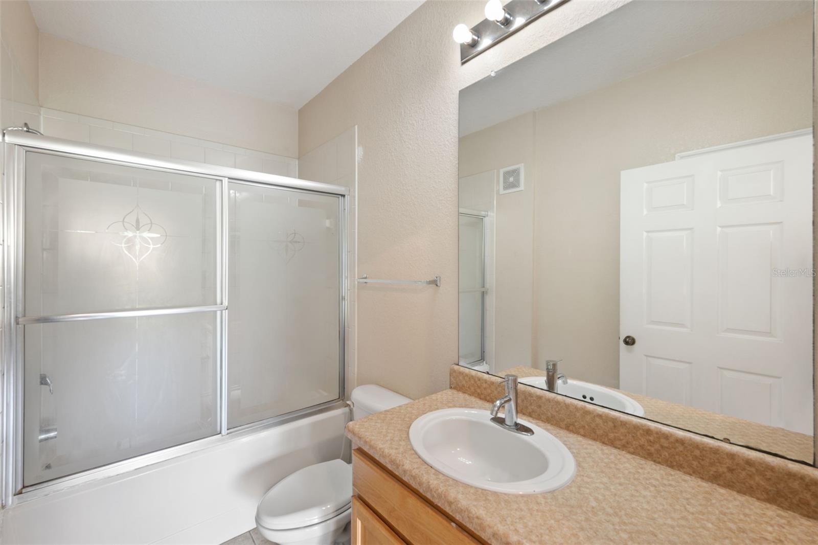 10209 COURTNEY PALMS BLVD #204