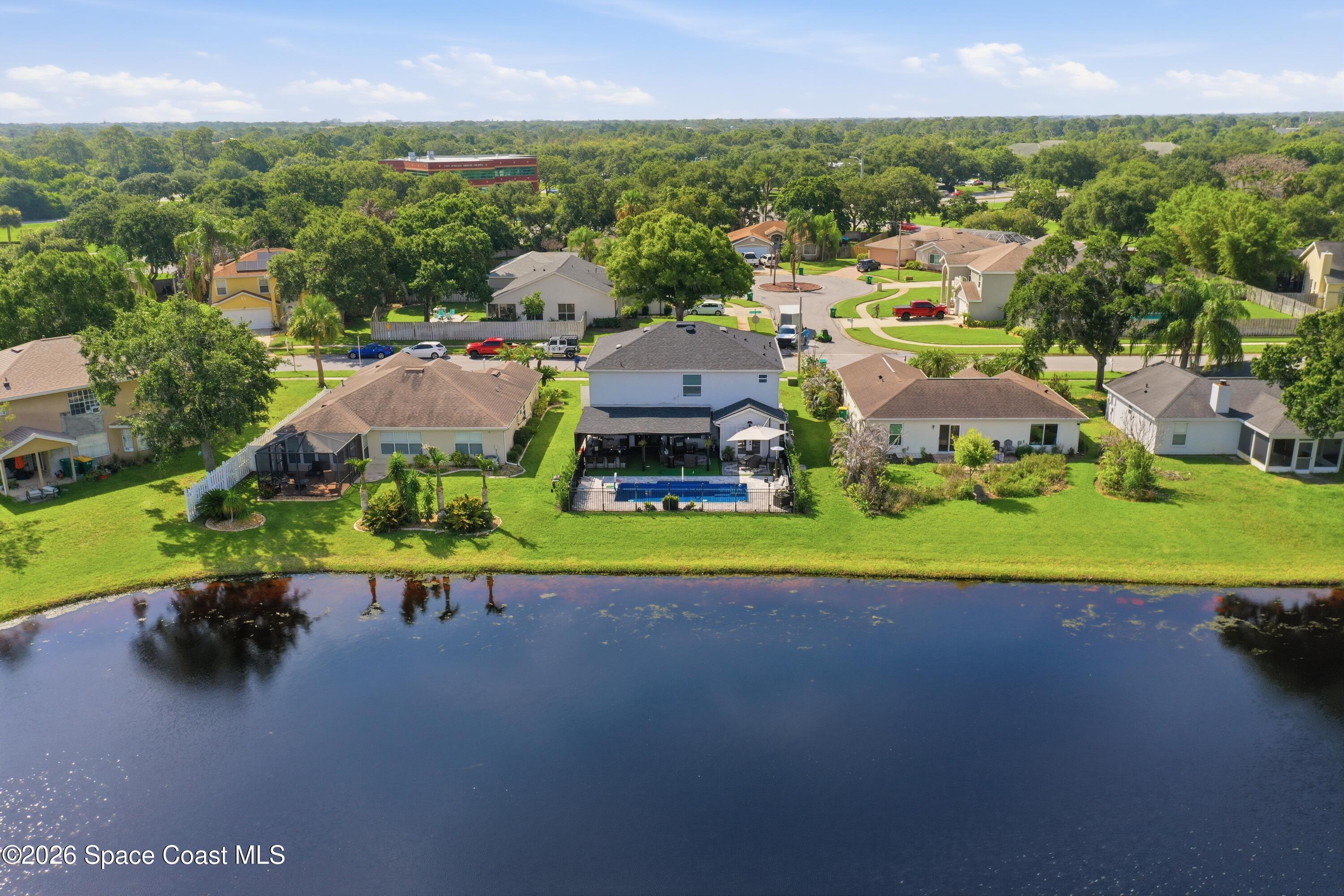 6976 Hammock Lakes Drive