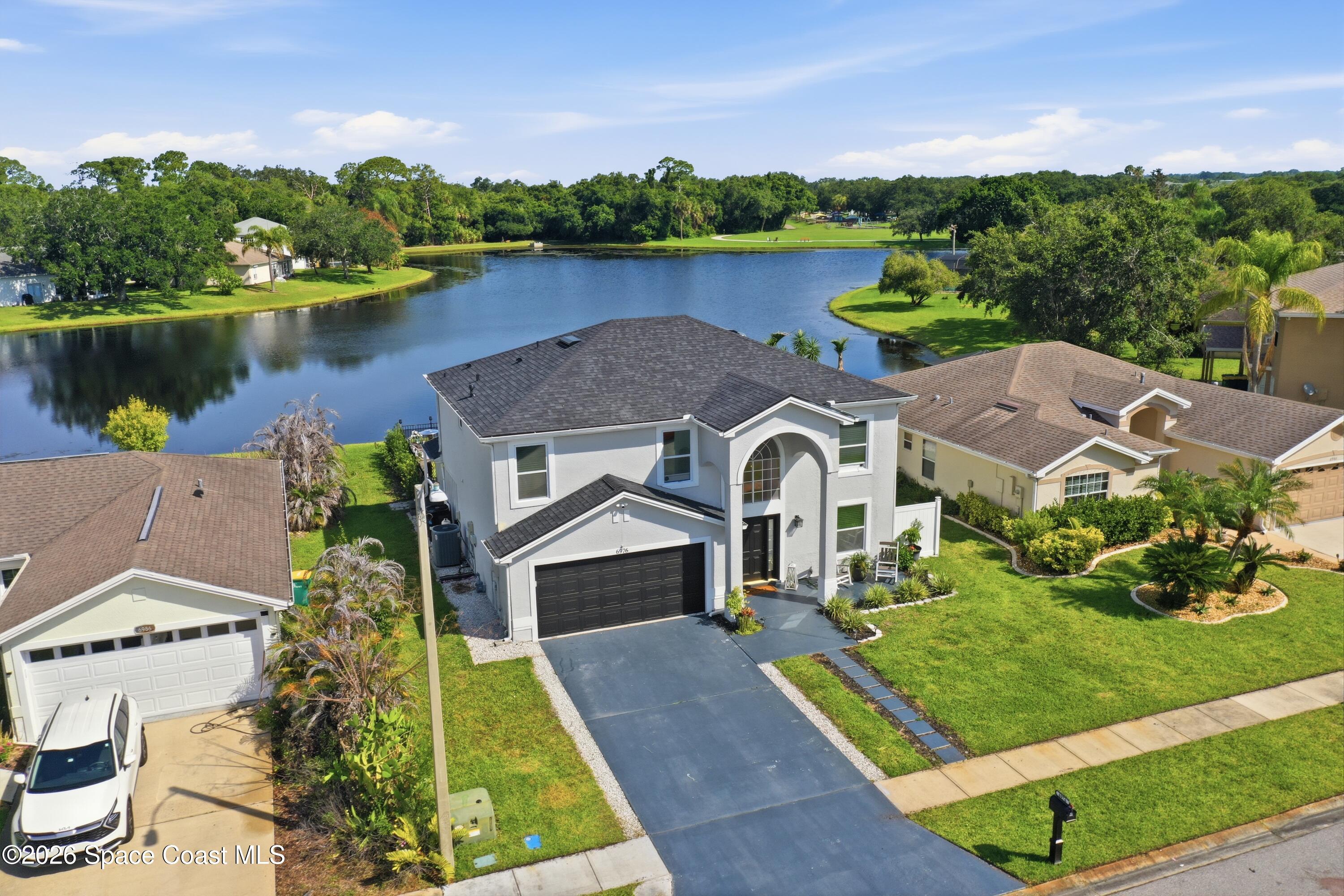 6976 Hammock Lakes Drive