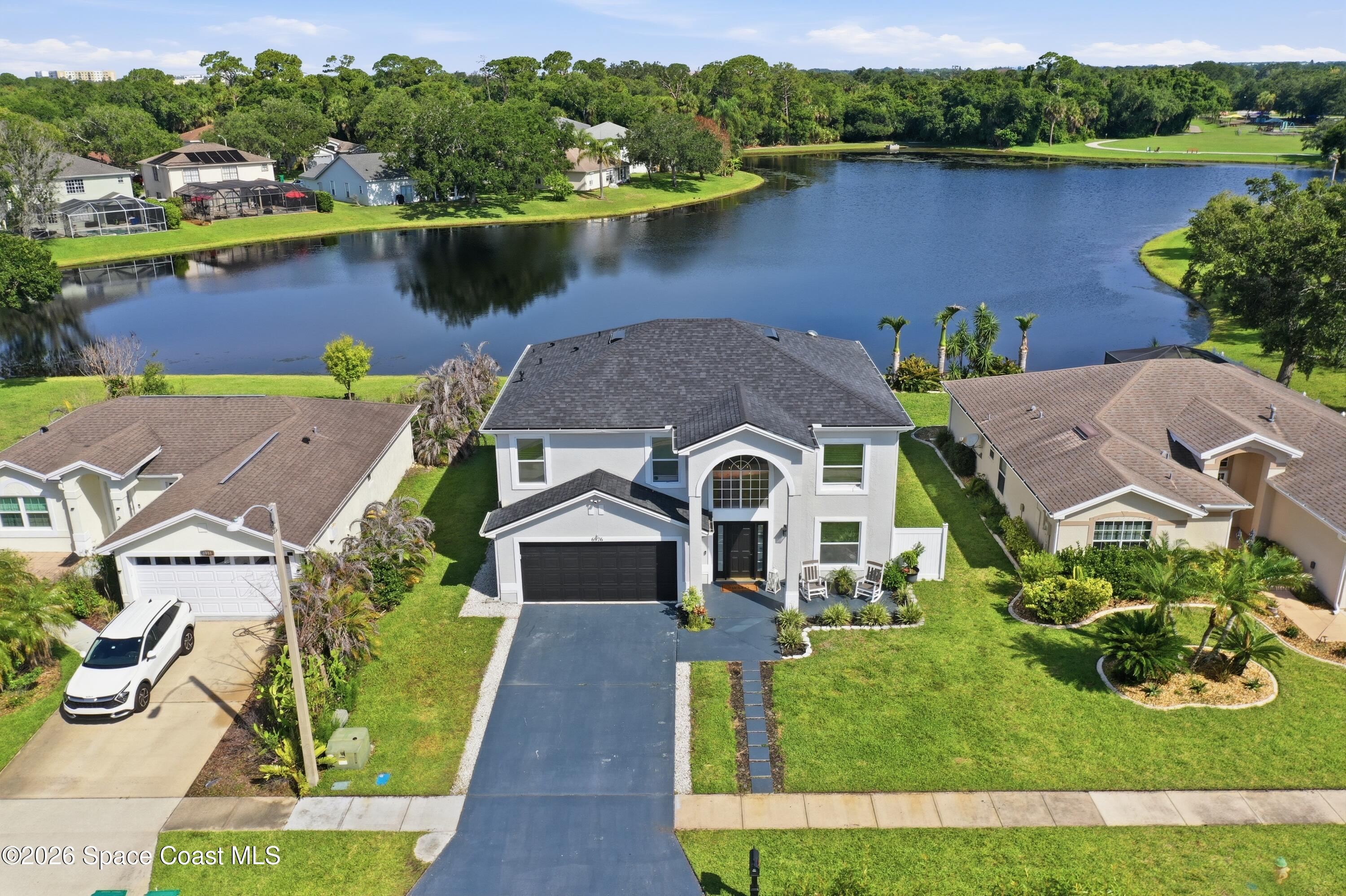 6976 Hammock Lakes Drive