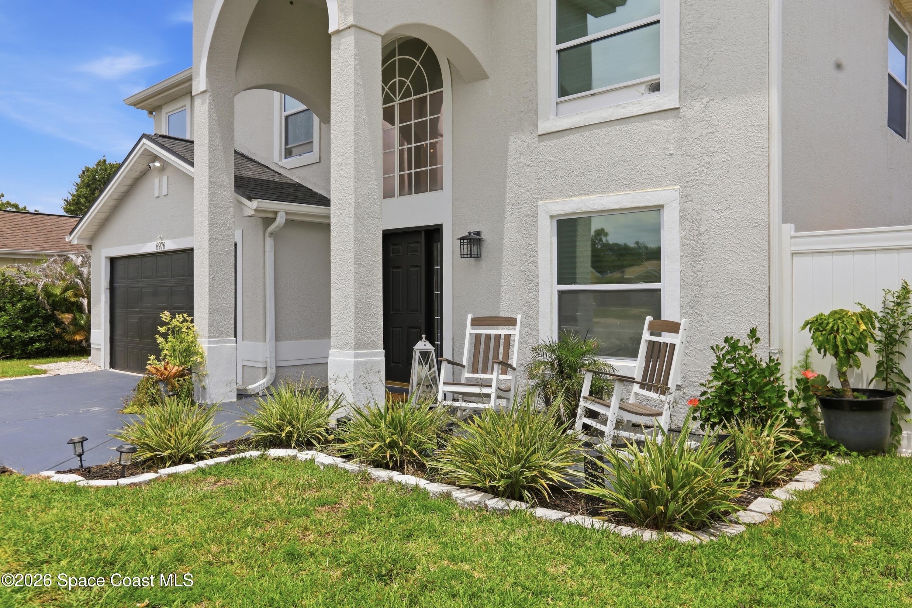 6976 Hammock Lakes Drive