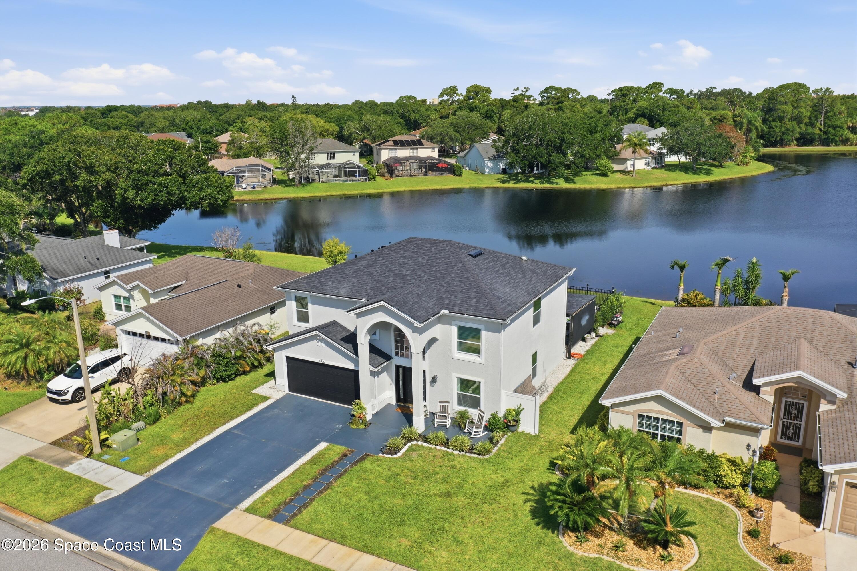 6976 Hammock Lakes Drive