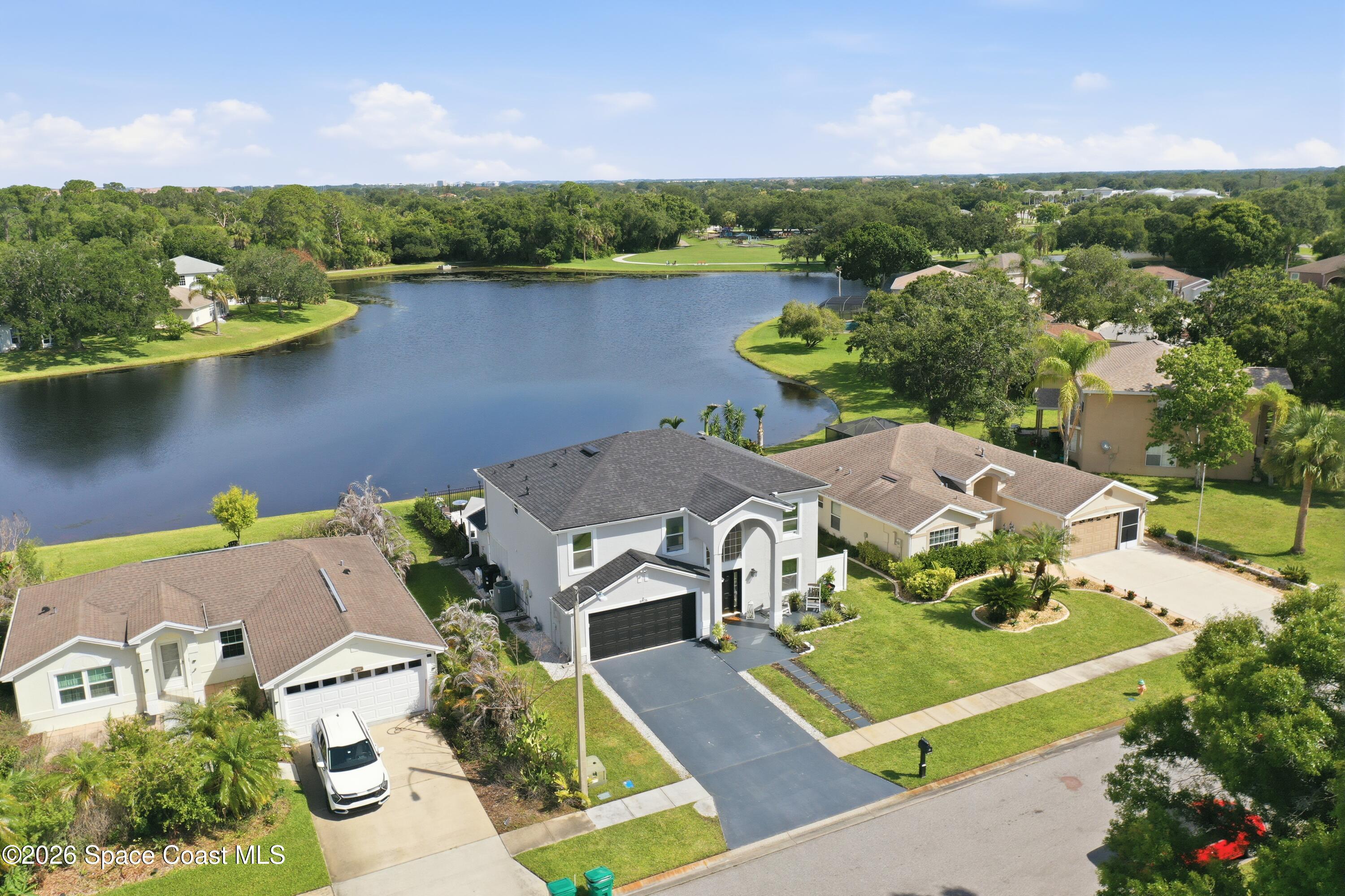 6976 Hammock Lakes Drive