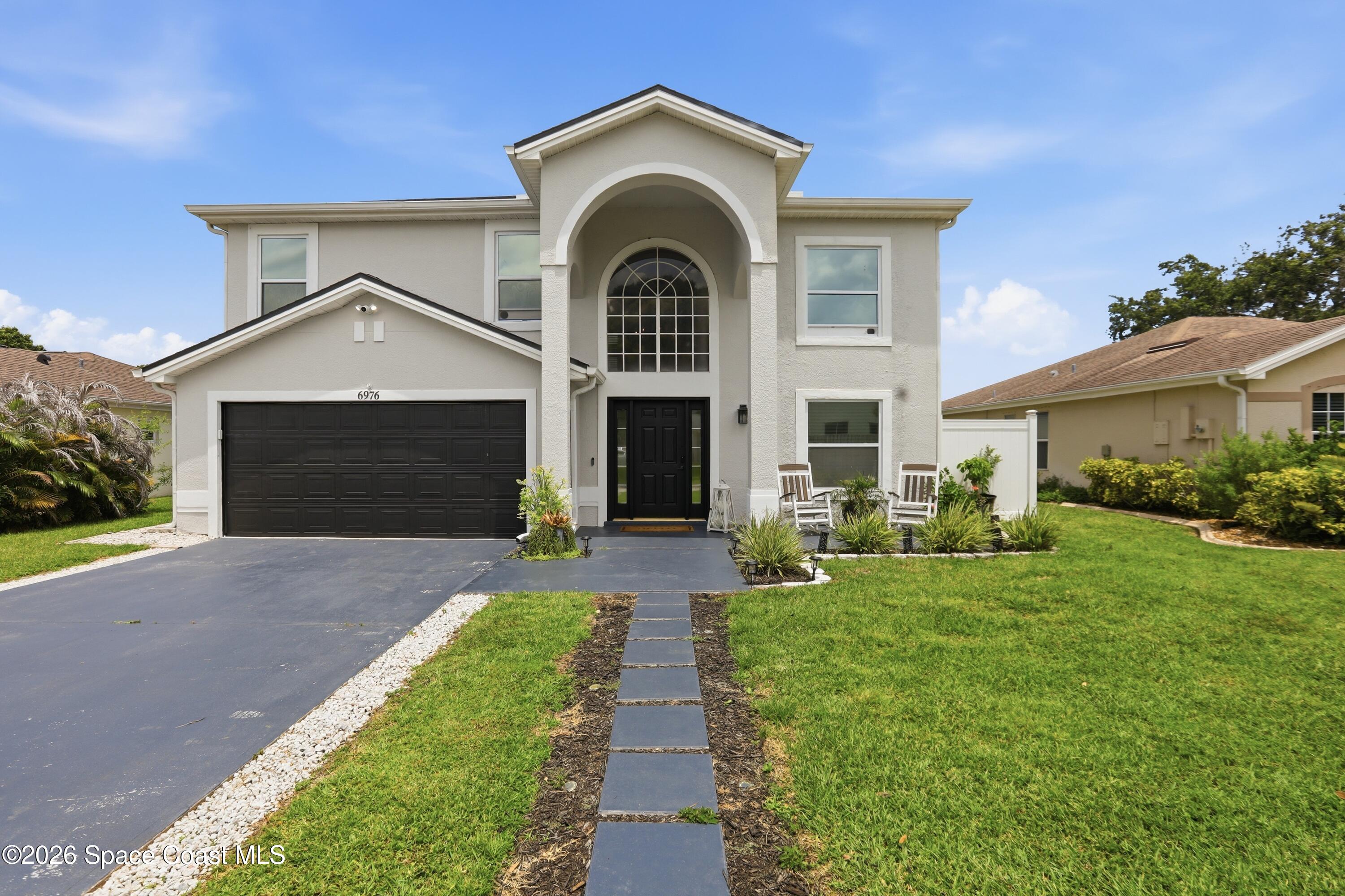 6976 Hammock Lakes Drive