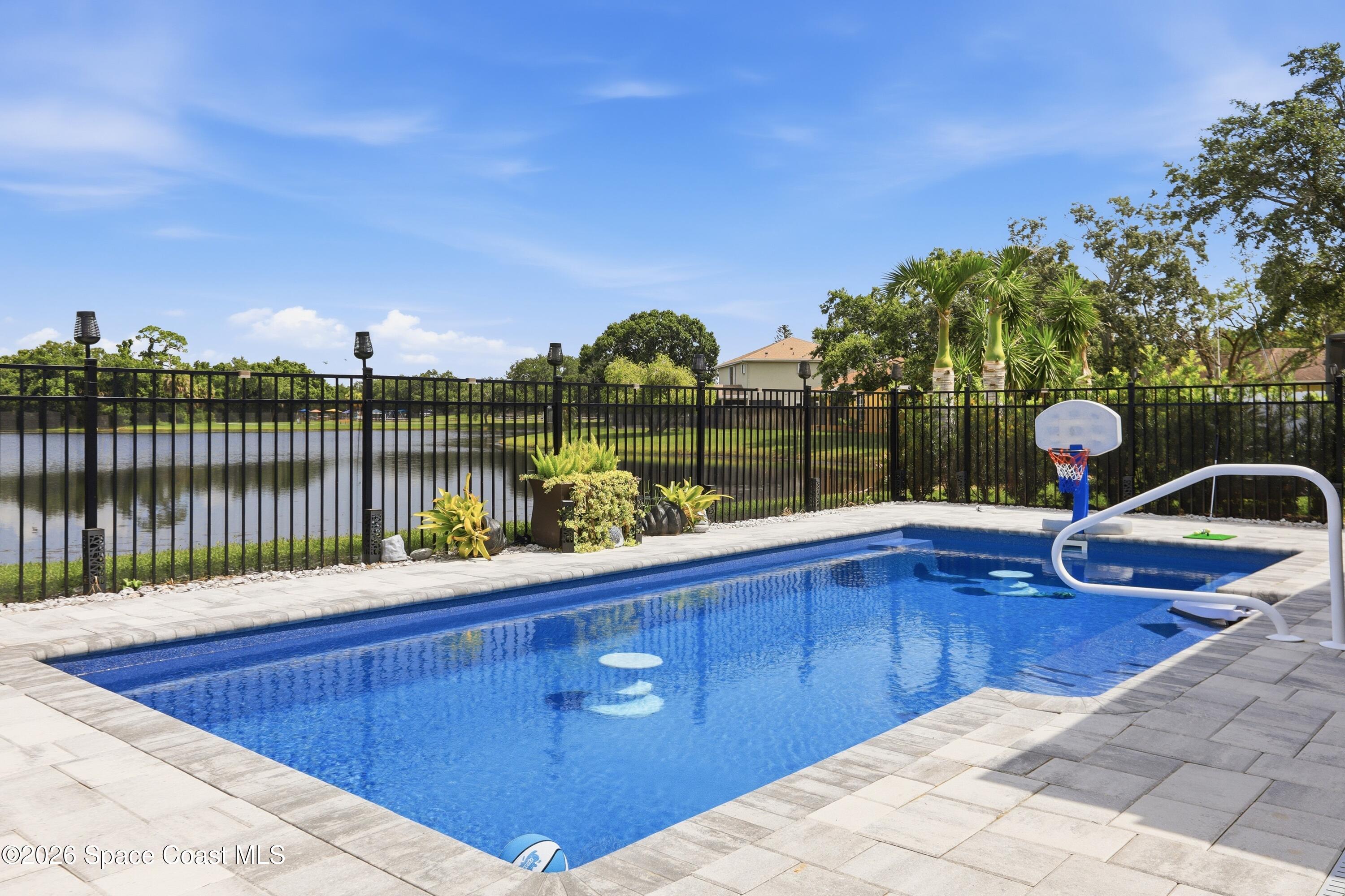 6976 Hammock Lakes Drive