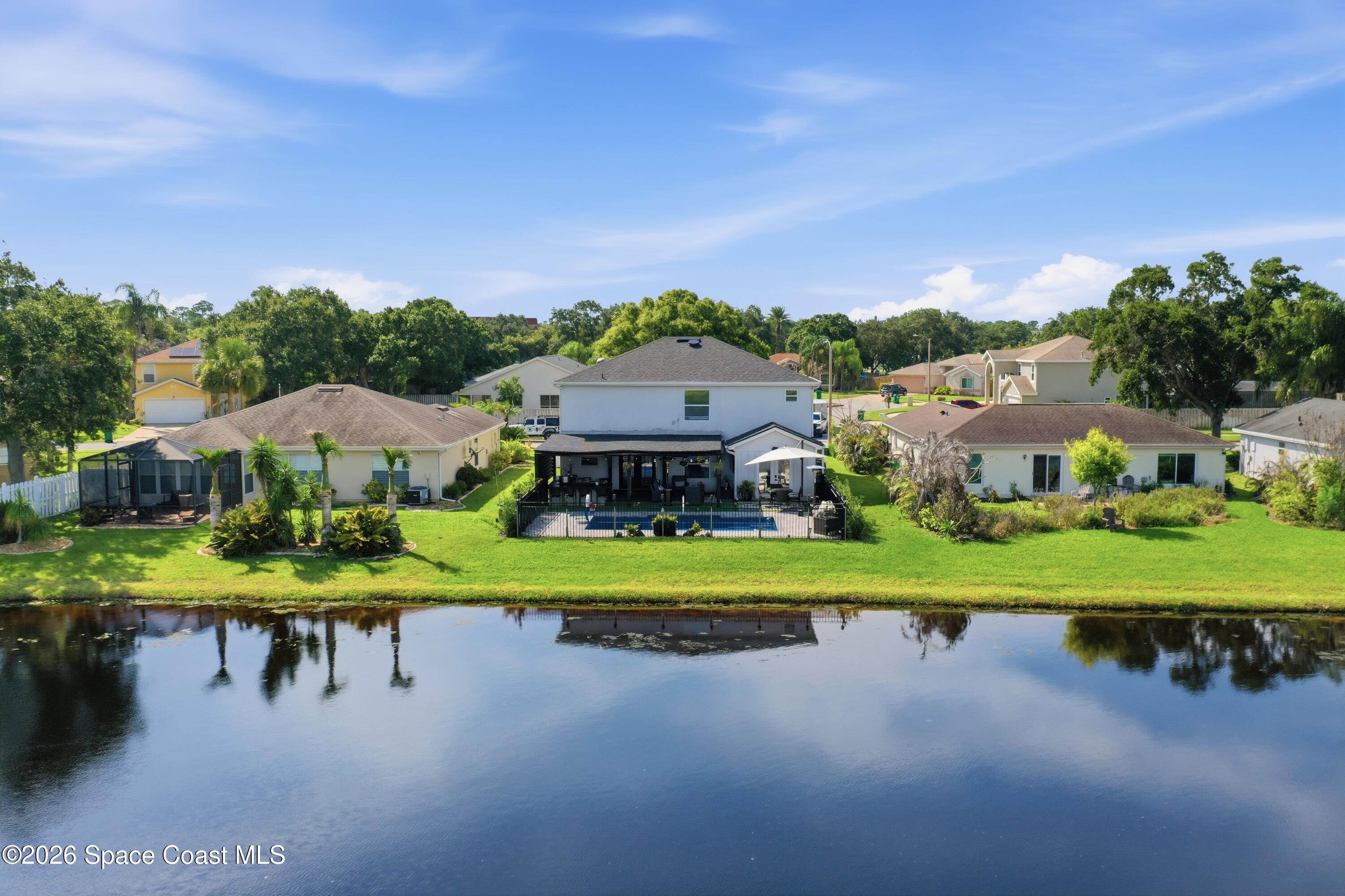 6976 Hammock Lakes Drive
