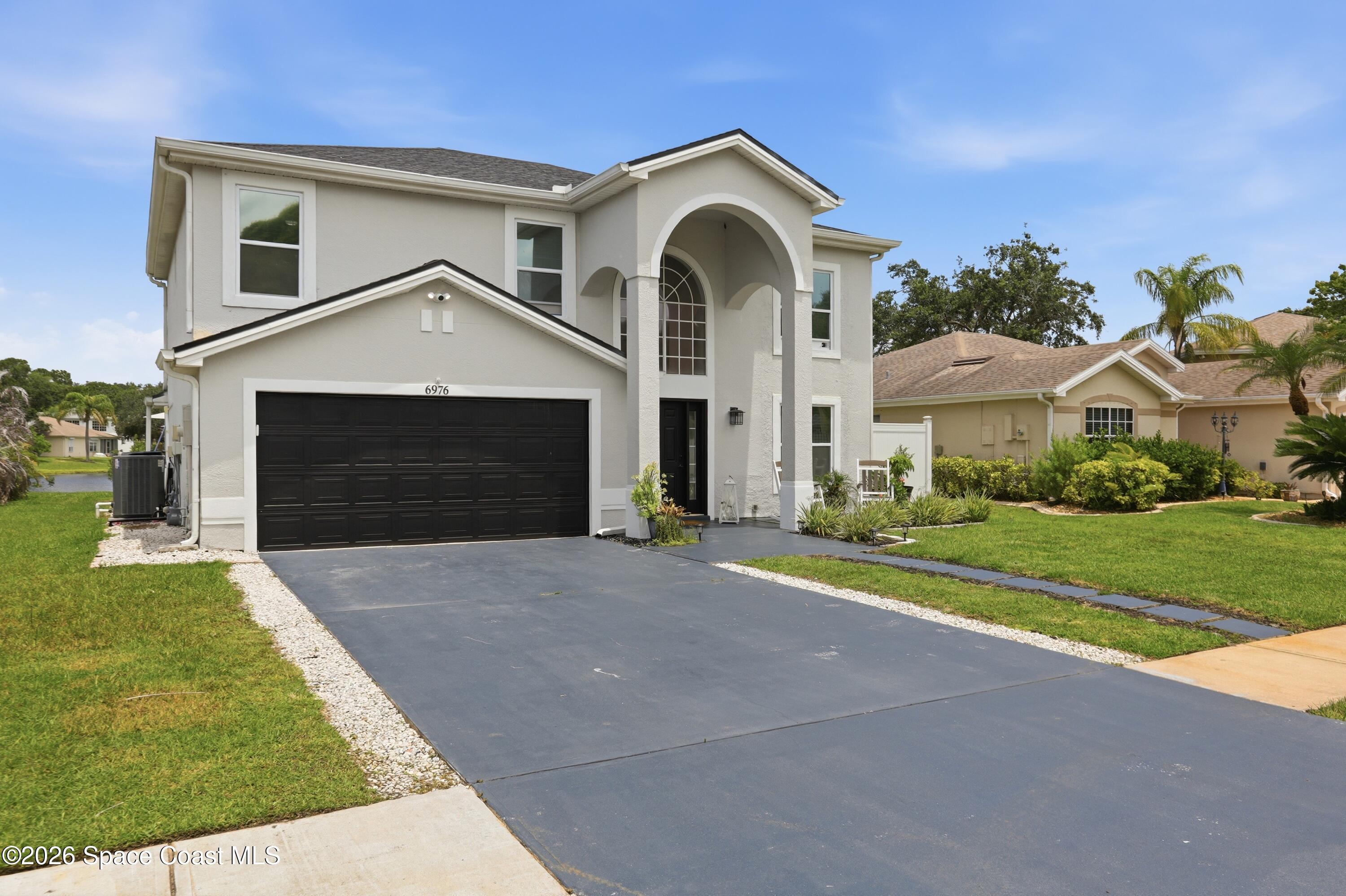 6976 Hammock Lakes Drive