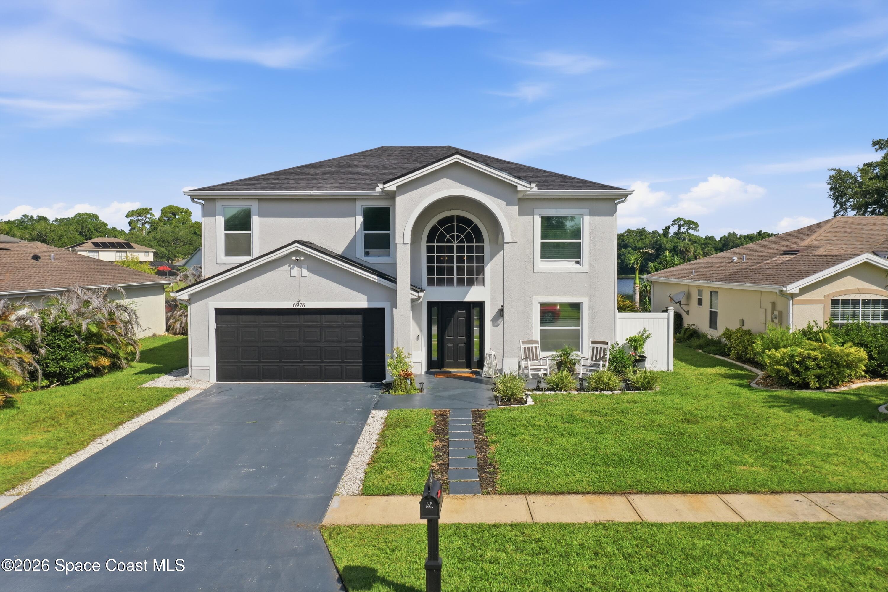 6976 Hammock Lakes Drive