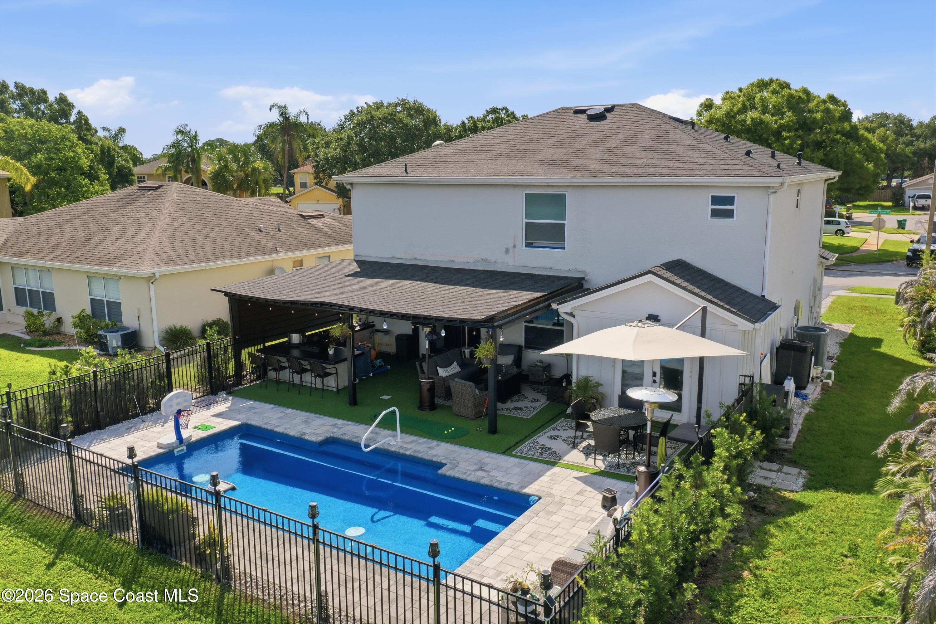 6976 Hammock Lakes Drive
