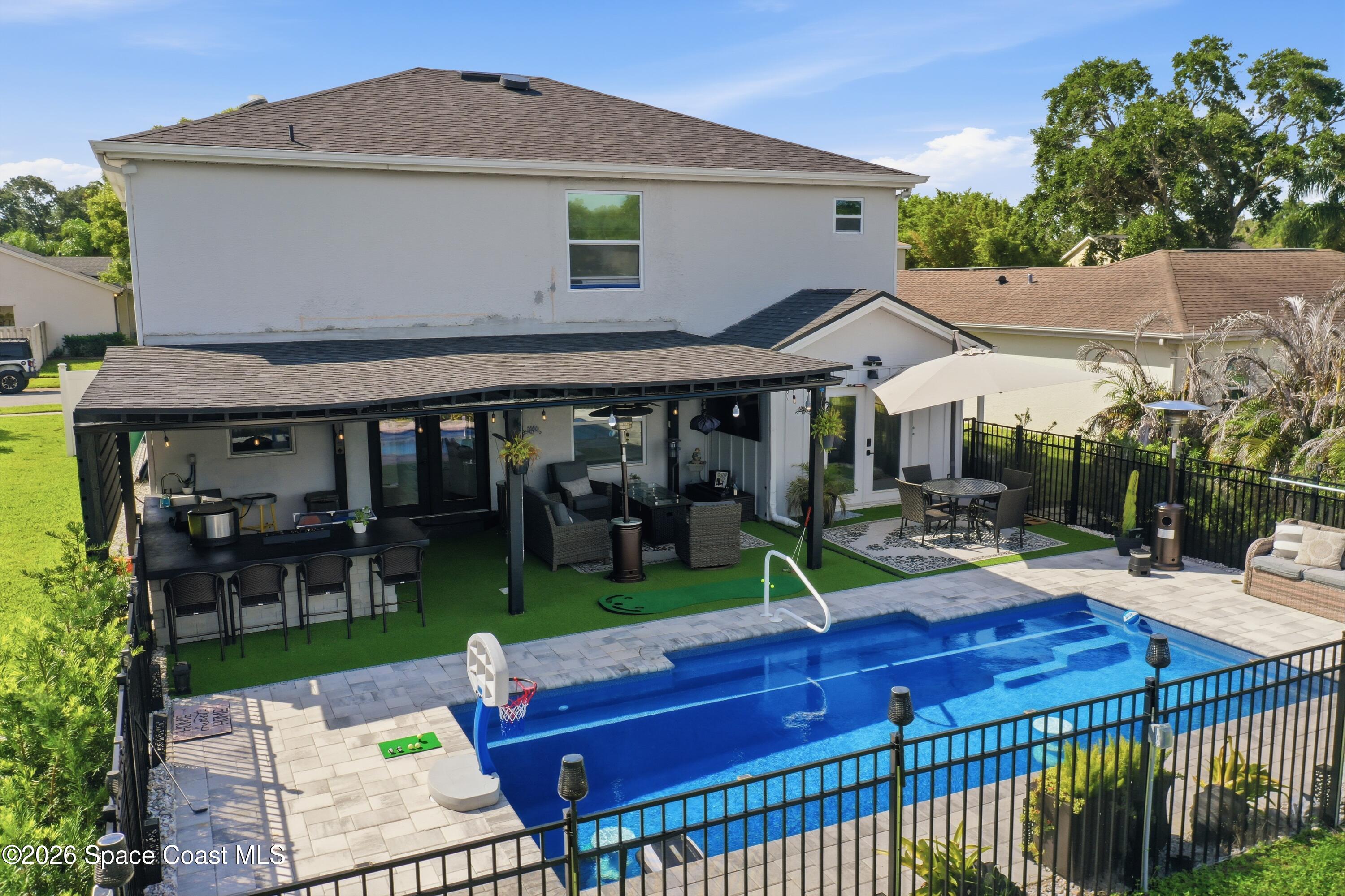 6976 Hammock Lakes Drive