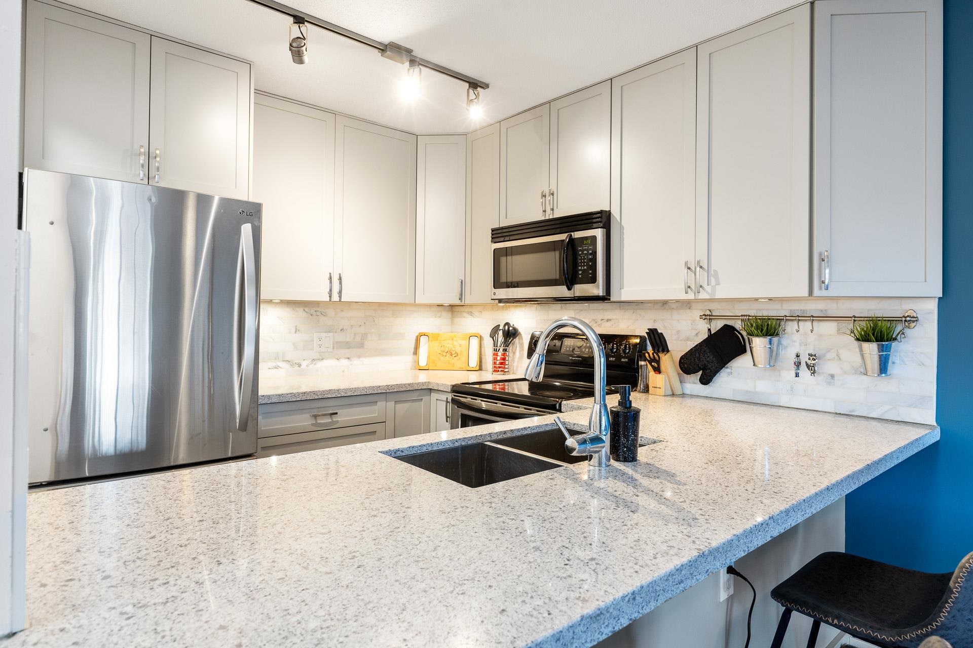 203 19750 64 AVENUE Unit: 203
