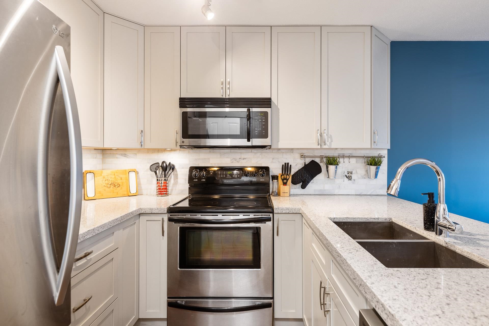 203 19750 64 AVENUE Unit: 203