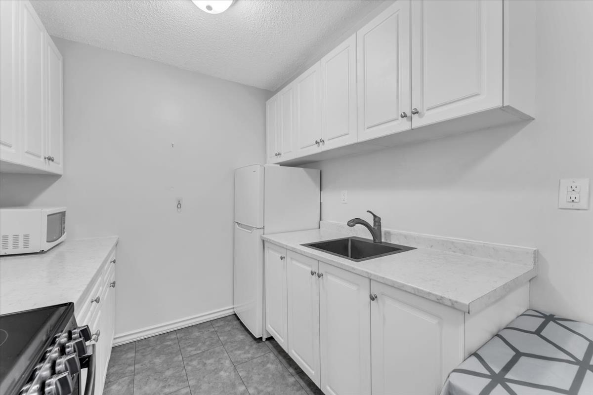 208 7220 LINDSAY ROAD Unit: 208