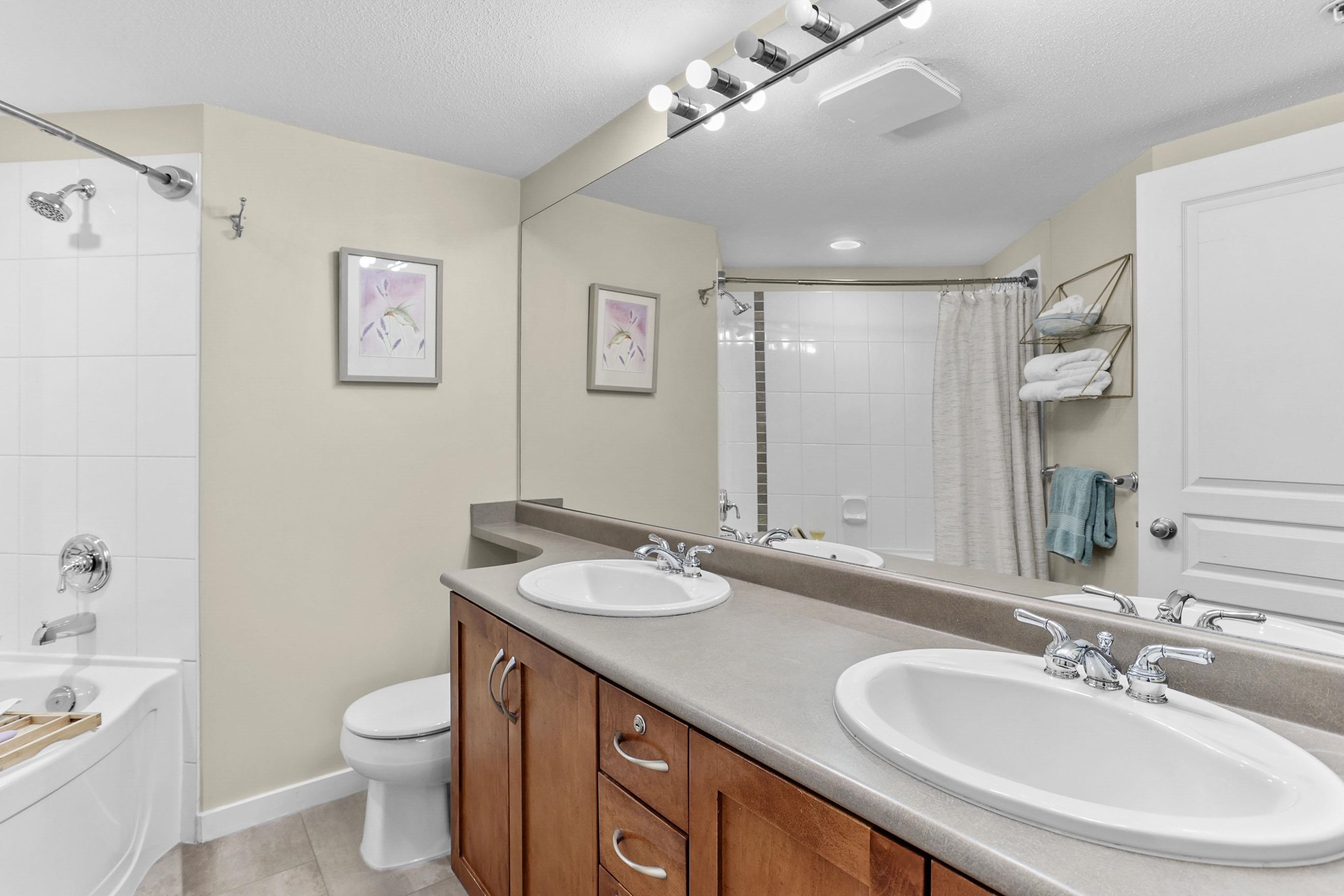 205 2958 WHISPER WAY Unit: 205
