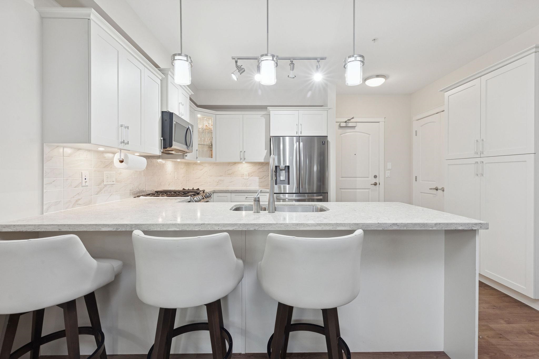 209 3535 146A STREET Unit: 209