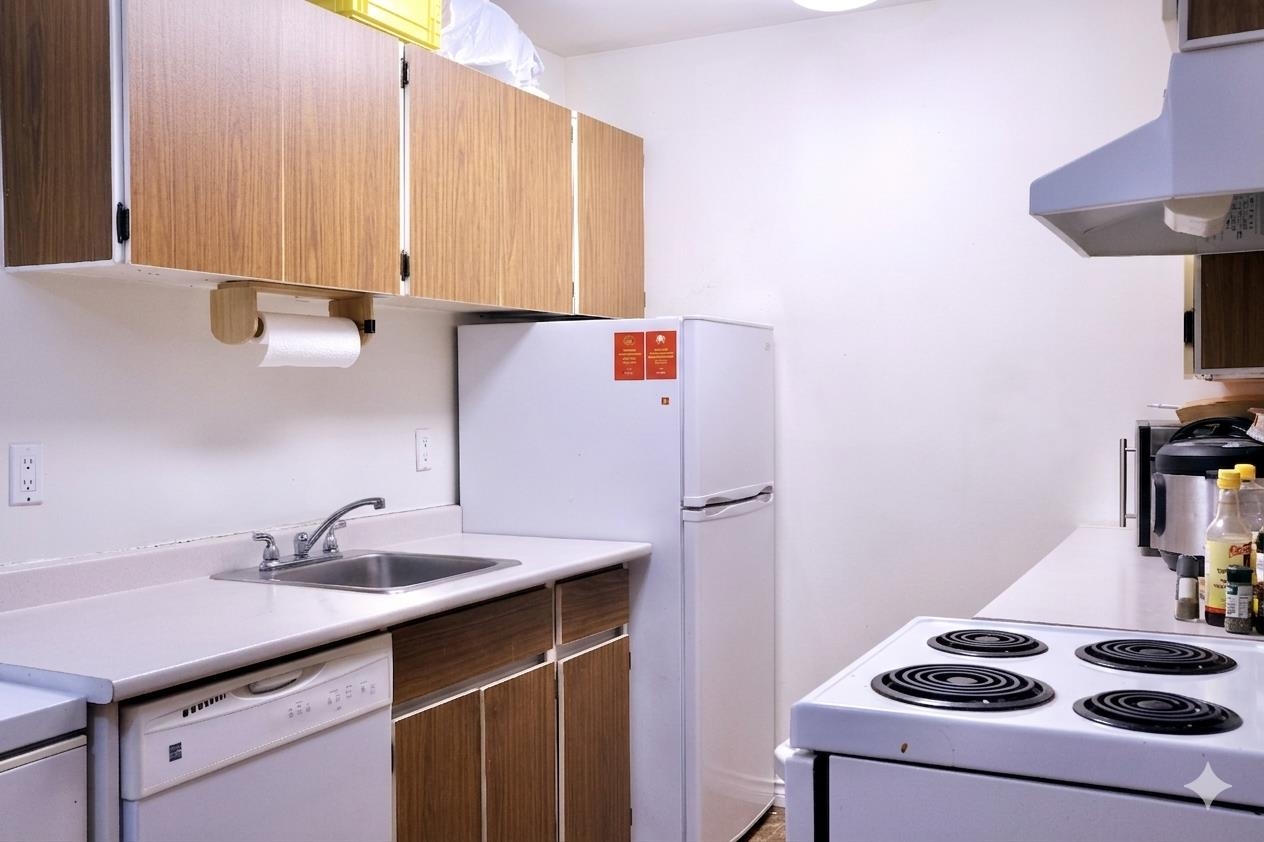 303 7260 LINDSAY ROAD Unit: 303