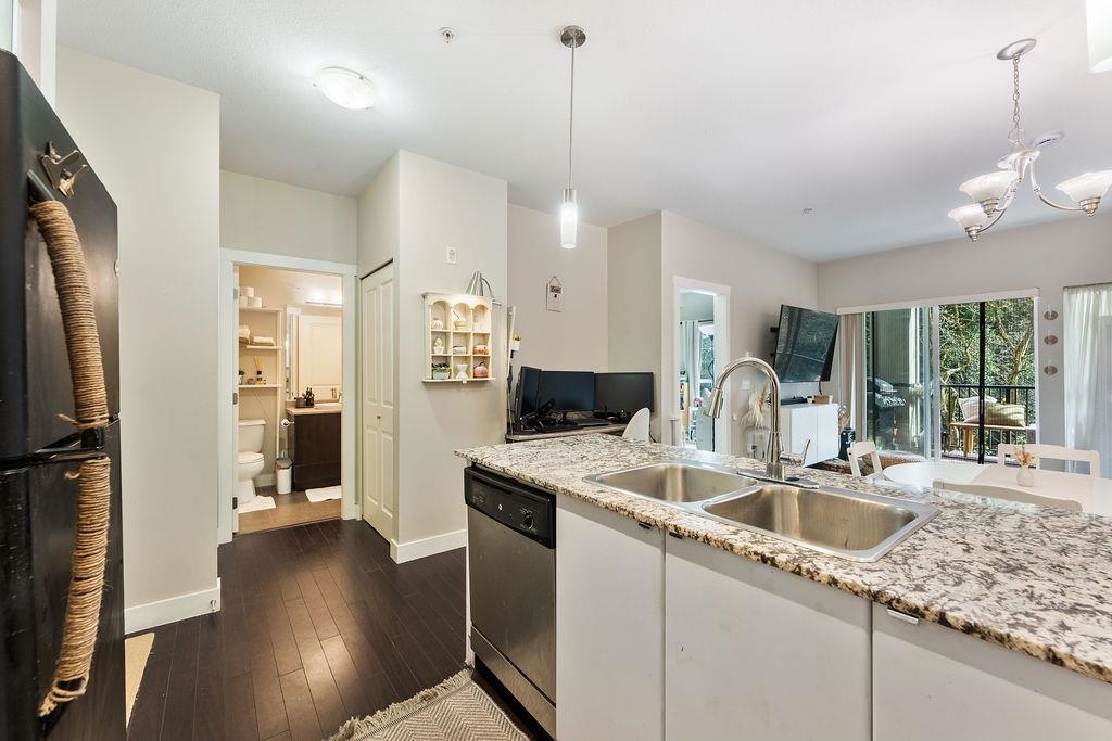 211 9655 KING GEORGE BOULEVARD Unit: 211