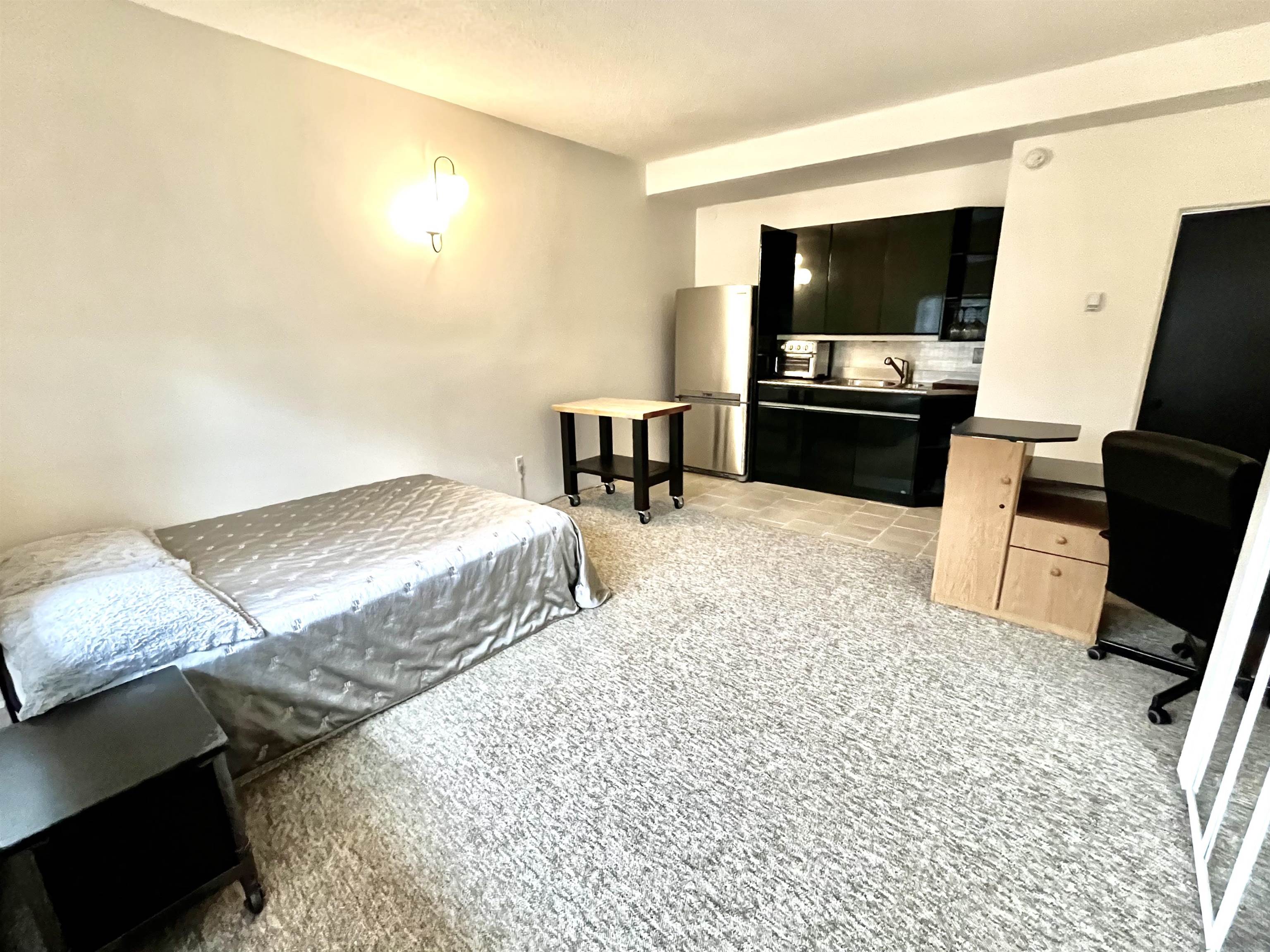 205 120 E 4TH STREET Unit: 205