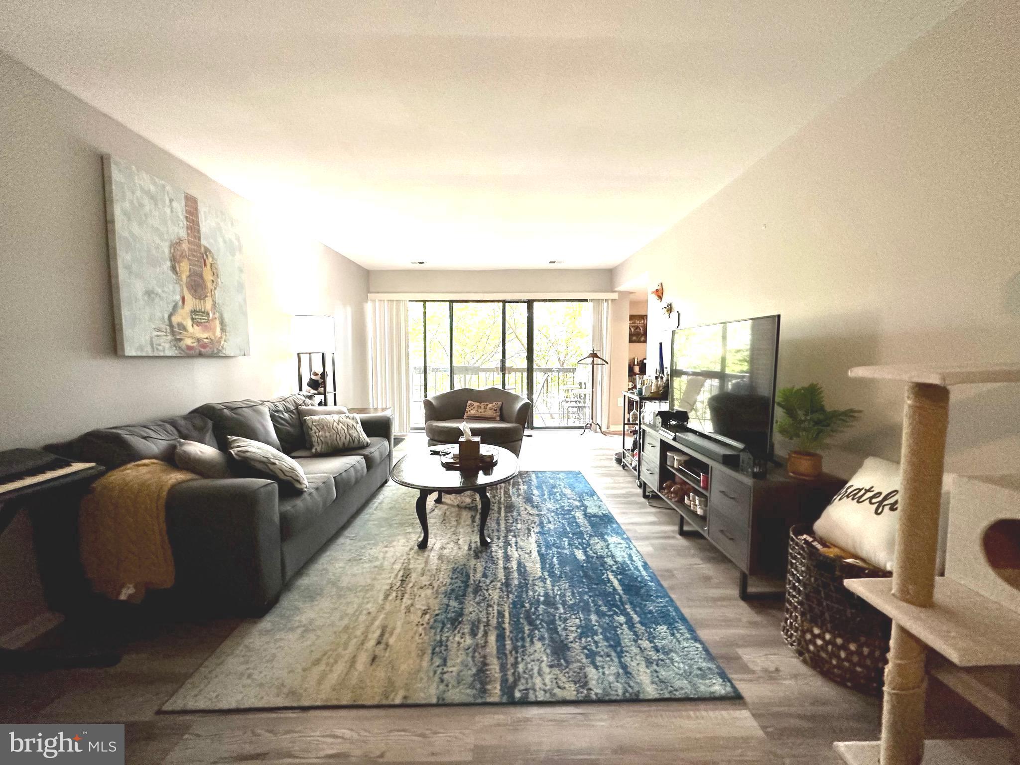 9715 Kings Crown Ct #102