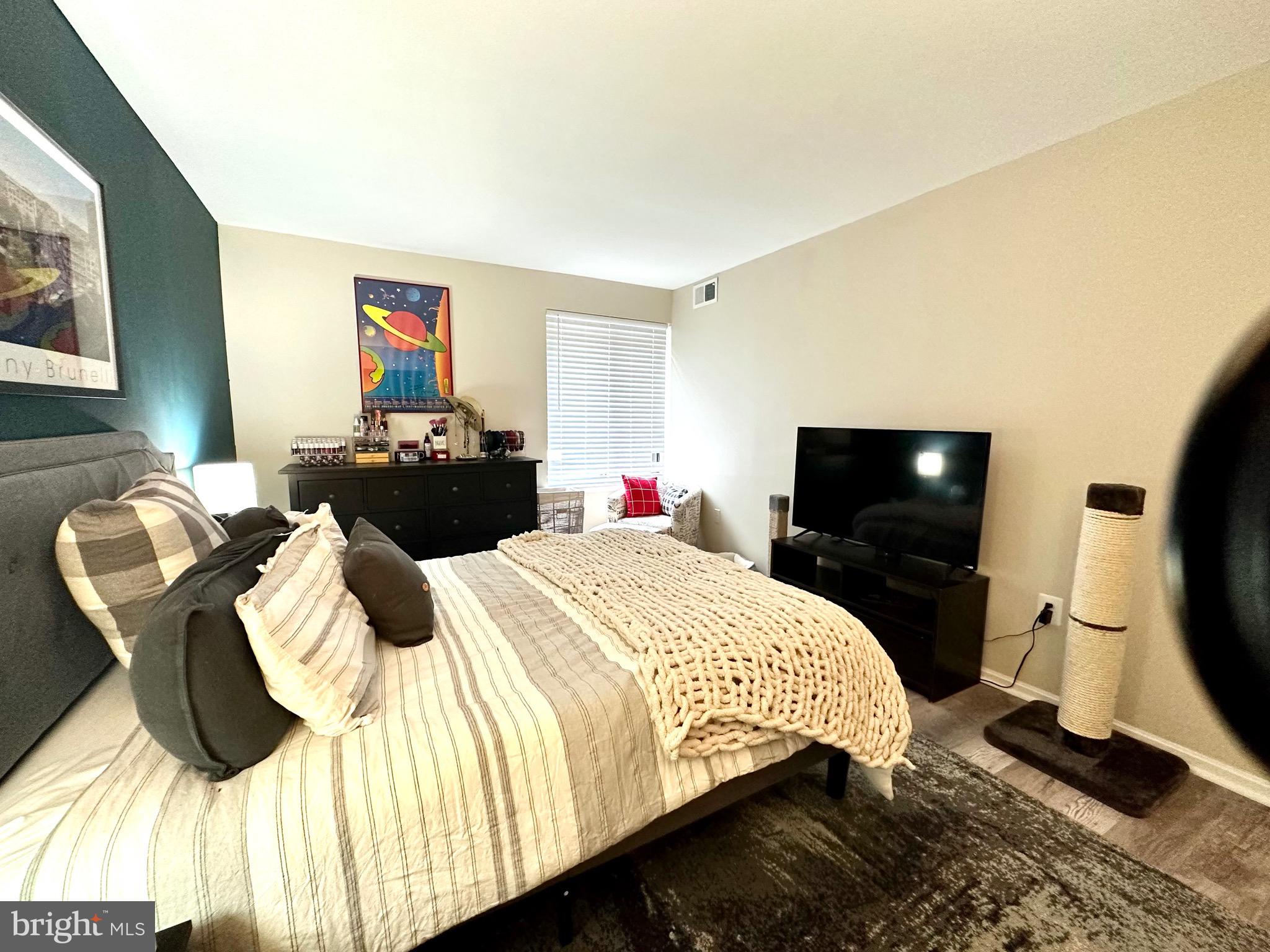 9715 Kings Crown Ct #102