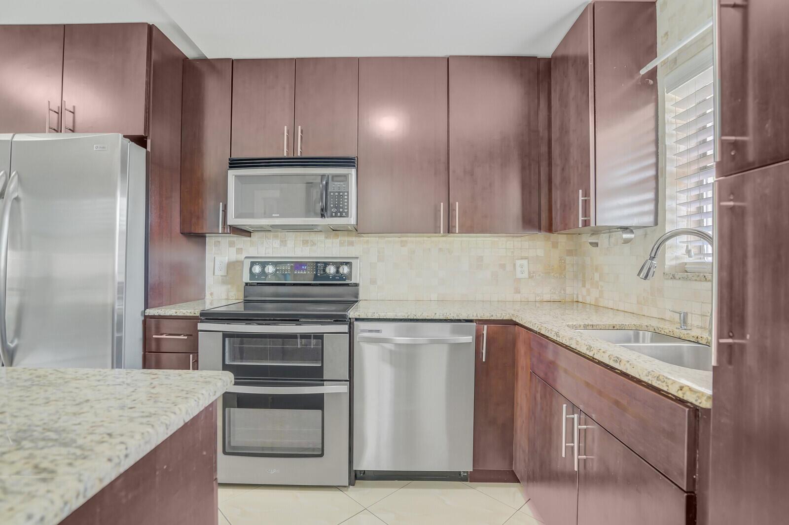 9851 Sandalfoot Boulevard 207