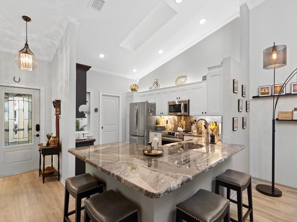 3870 SW Whispering Sound Drive