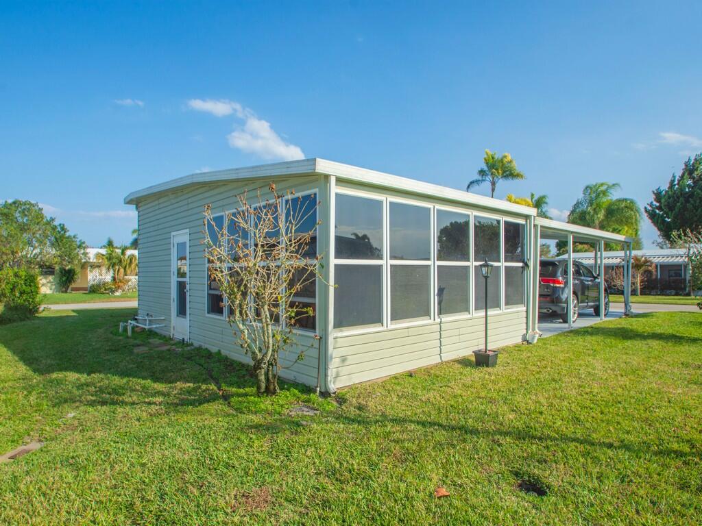 309 NE Pinelake Village Boulevard