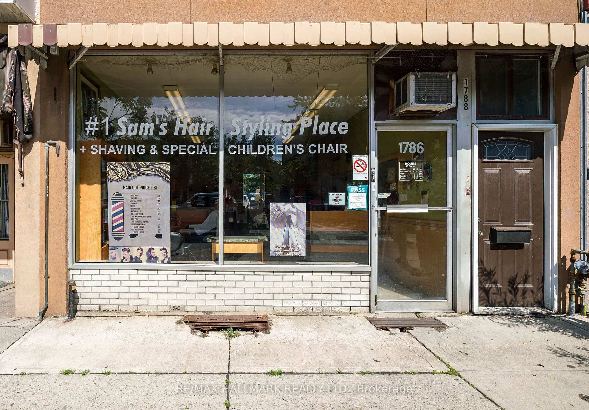 Hair salon storefront with a cream awning, large windows, and a separate entrance at 1786.
