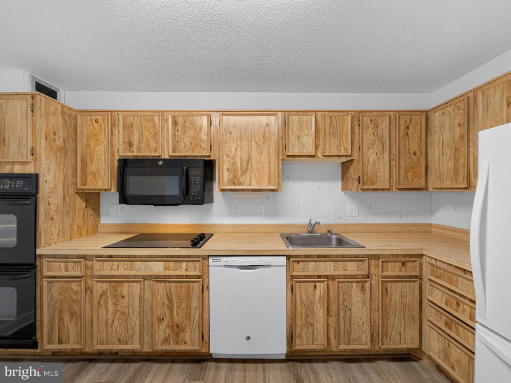 8370 GREENSBORO DRIVE Unit: 411