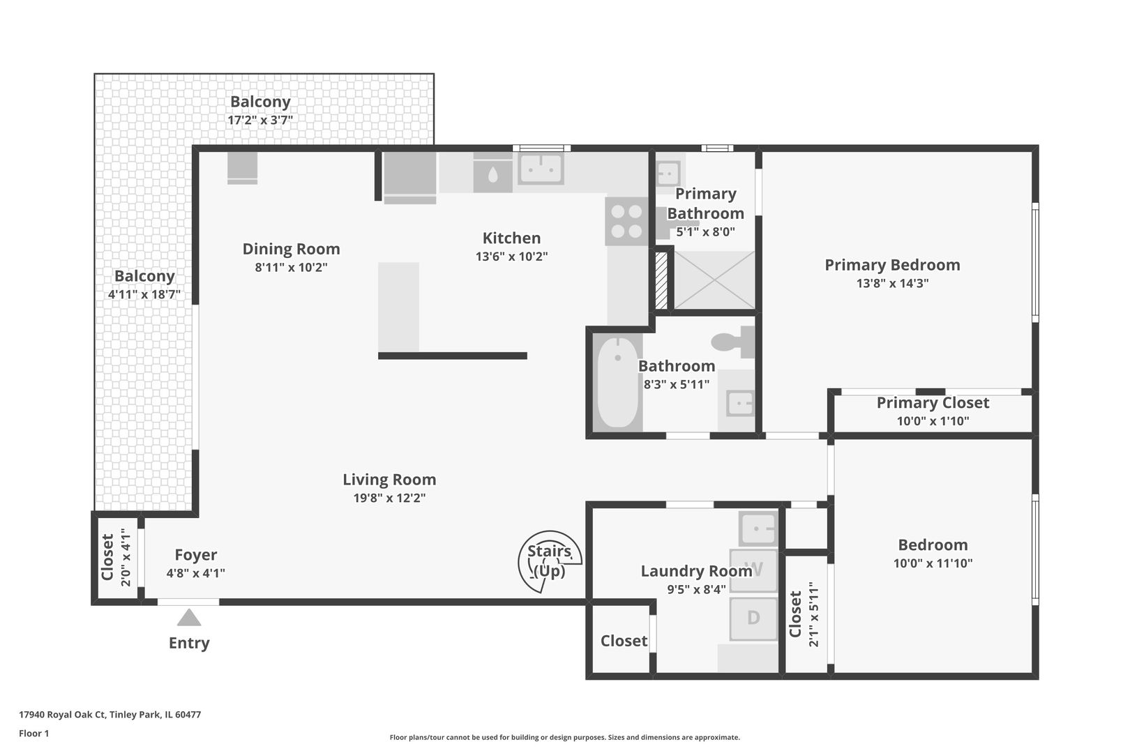 First-floor plan with two bedrooms, two bathrooms, open living and dining areas, laundry room, and two balconies.