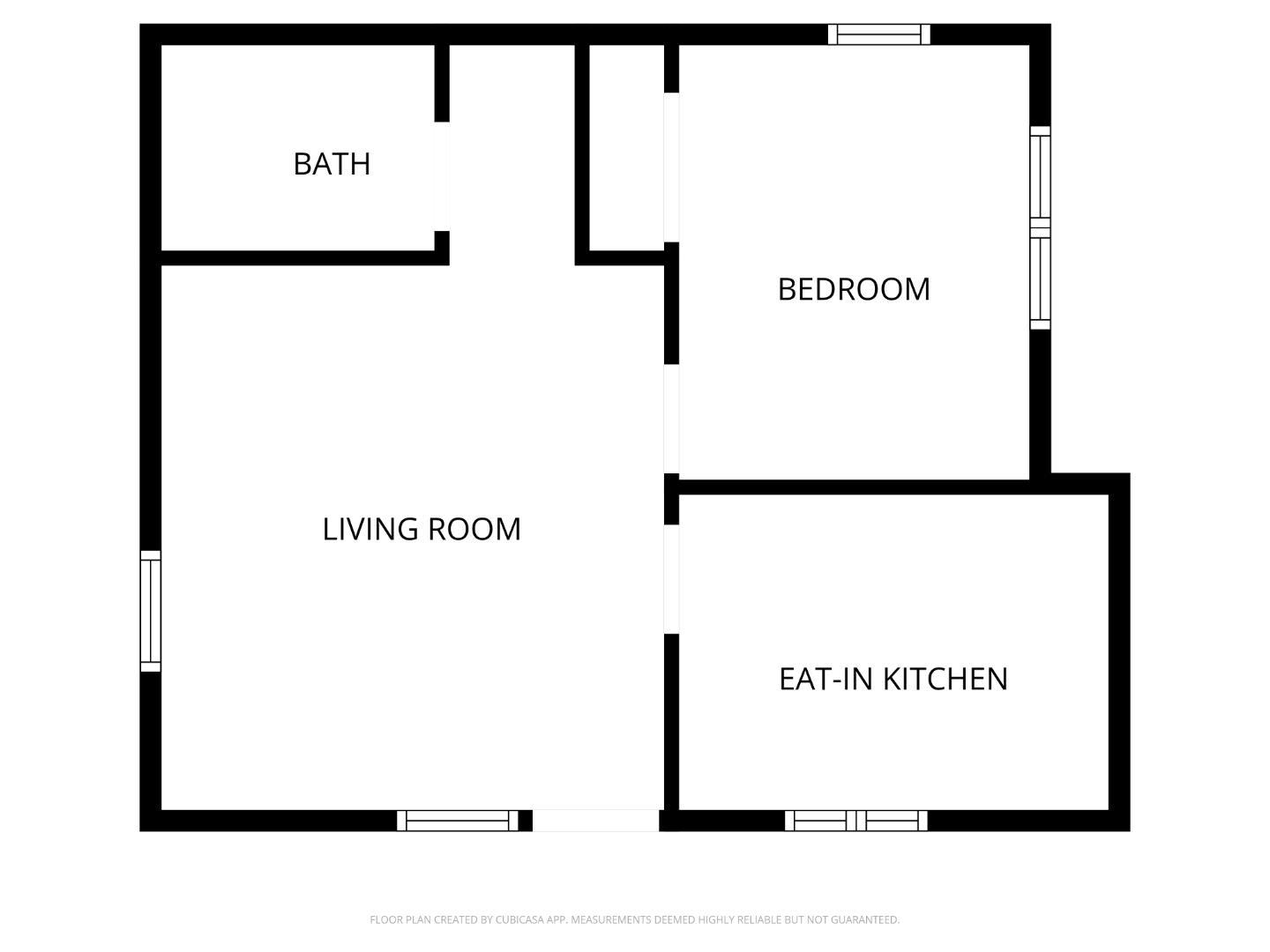 Floor plan showing a bath, bedroom, living room, and eat-in kitchen.