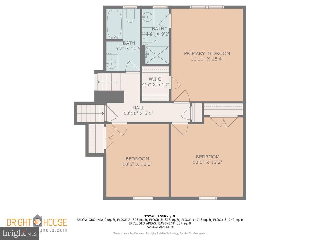 Second-floor plan with a primary bedroom, two bedrooms, two bathrooms, walk-in closet, and room dimensions.