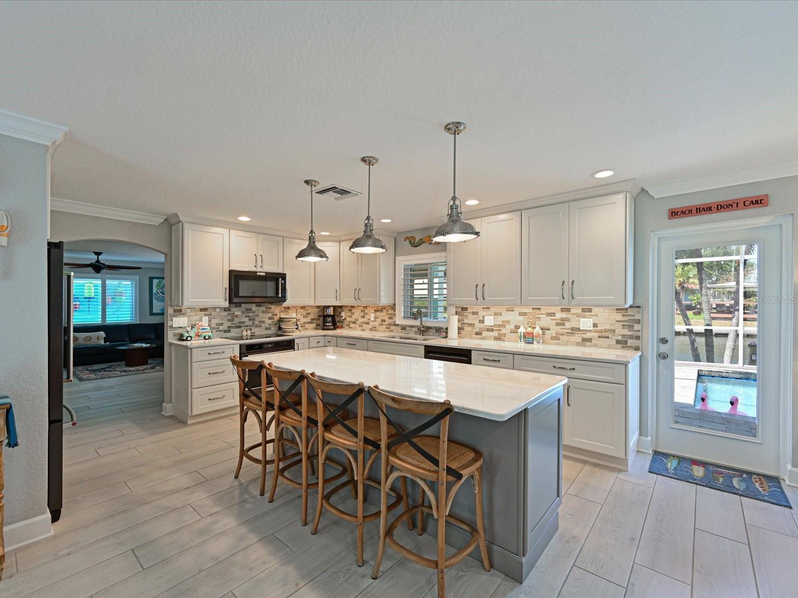 10016 SPOONBILL RD E