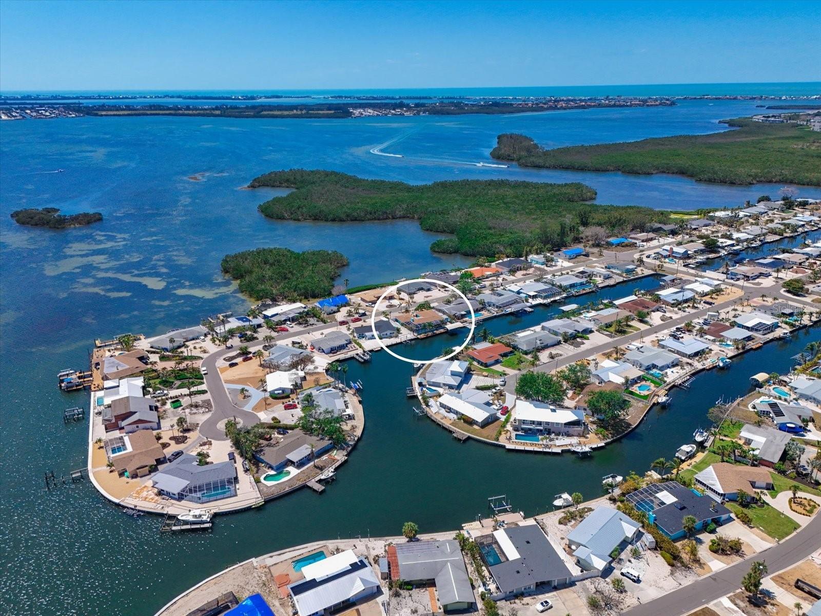 10016 SPOONBILL RD E