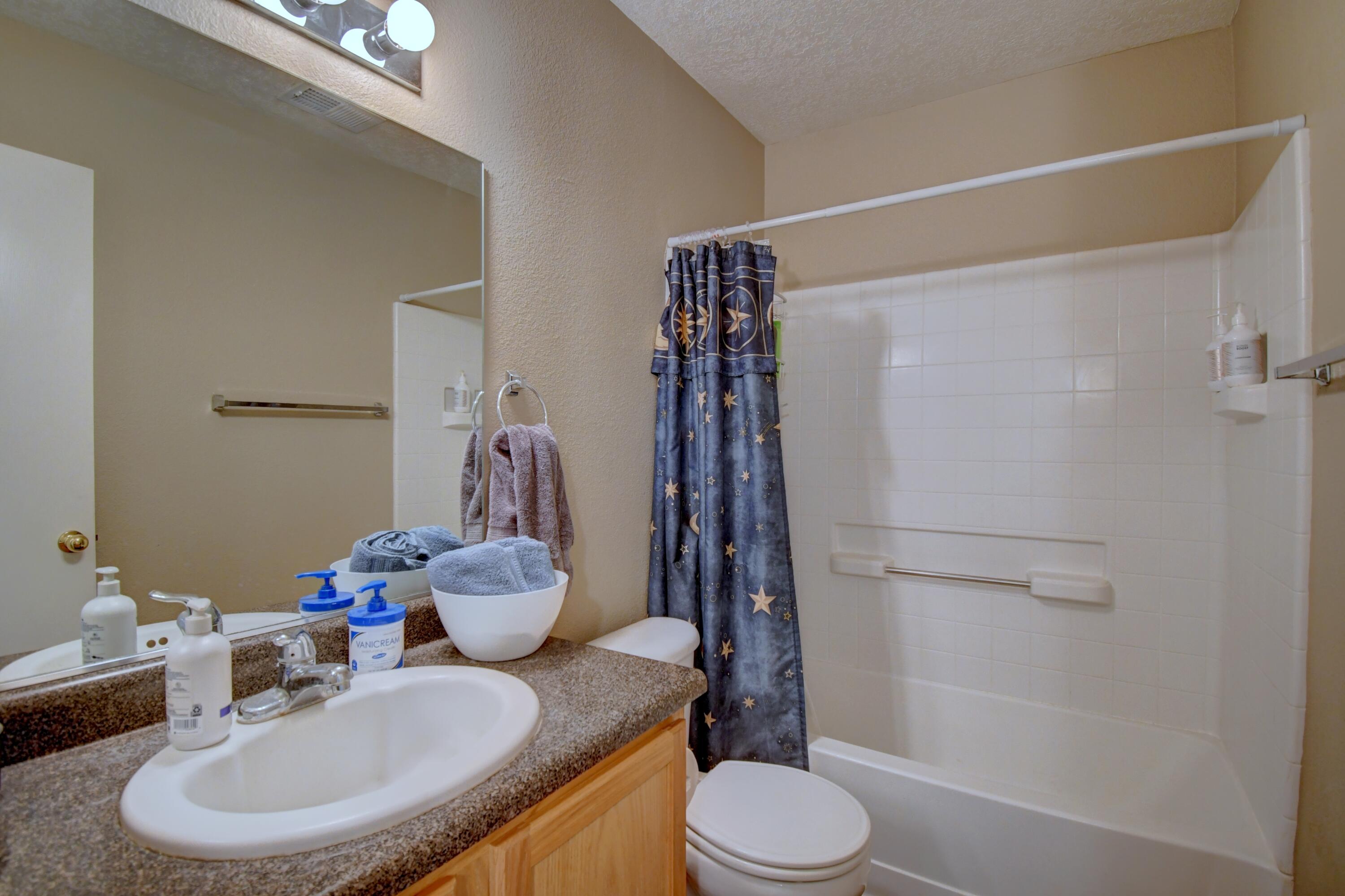 5819 NIGHT SHADOW Avenue NW