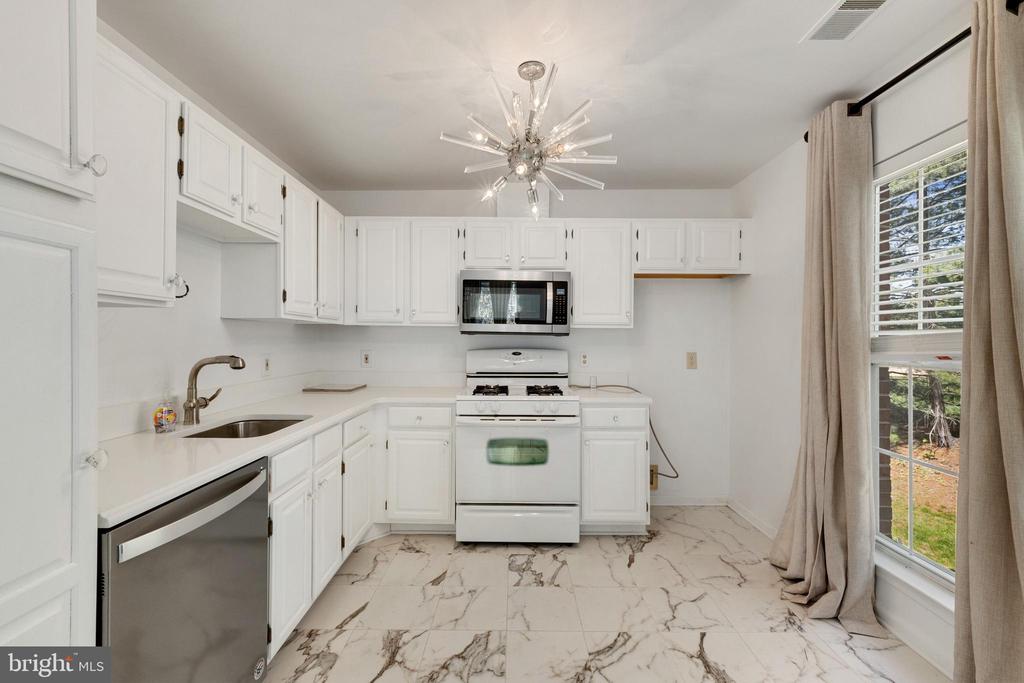 5921 MILLRACE COURT I-203