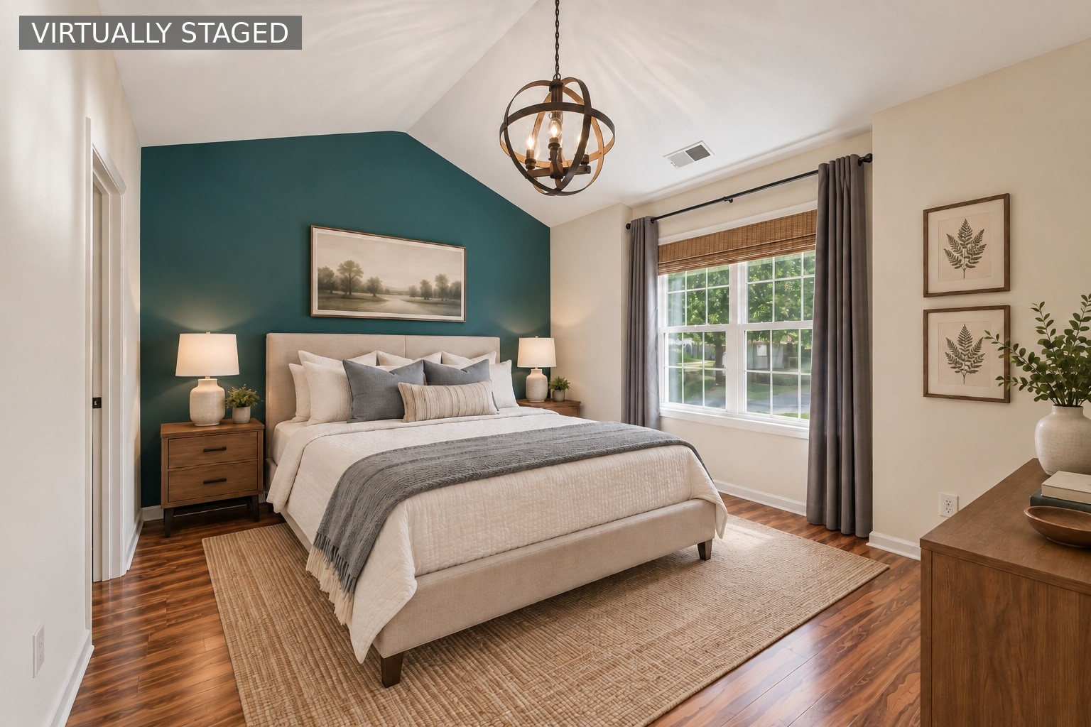Virtually staged bedroom with a bed against a teal accent wall and a sunlit window.