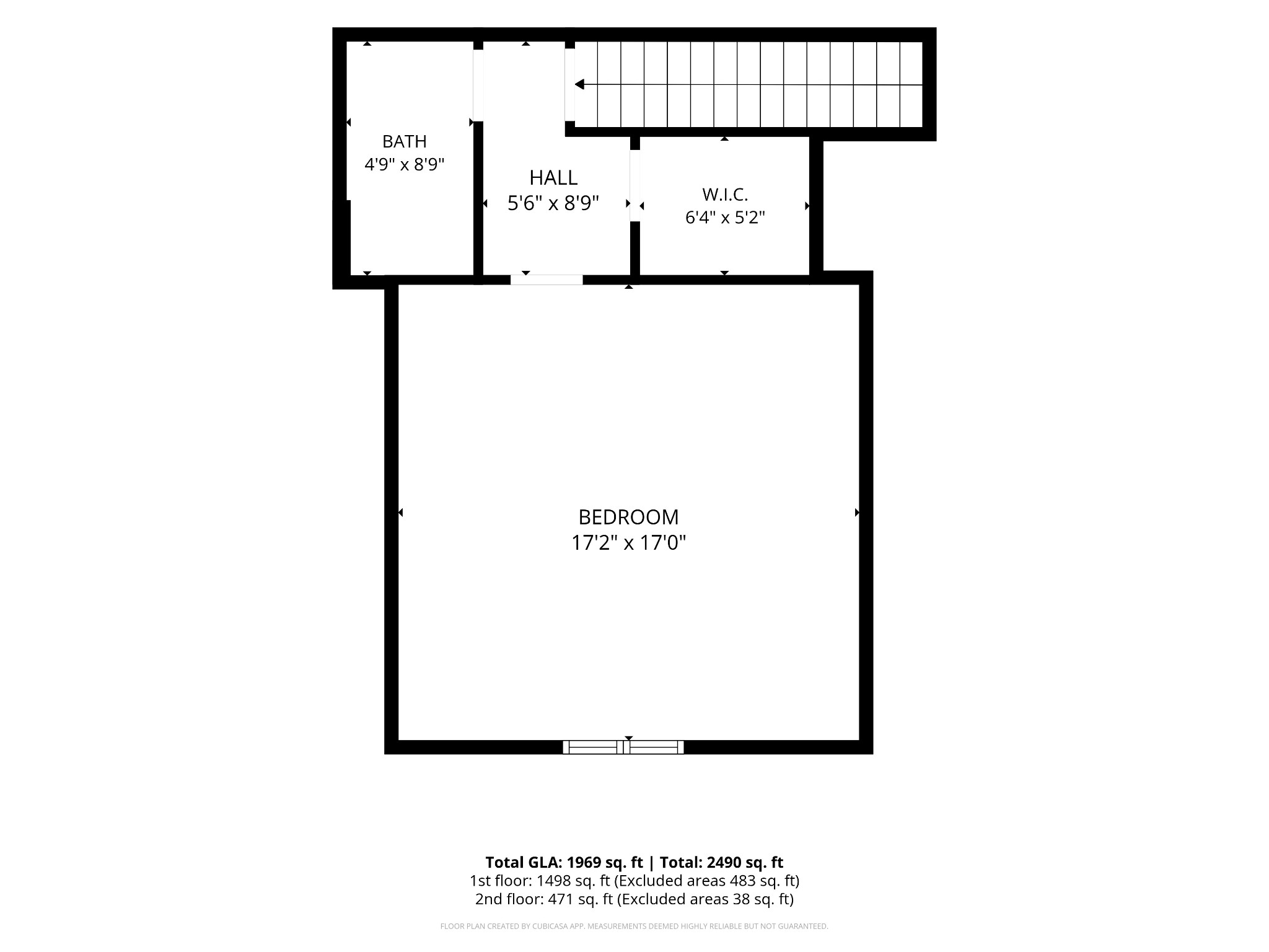 Floor plan showing a large bedroom, bath, hall, walk-in closet, and staircase with room dimensions.