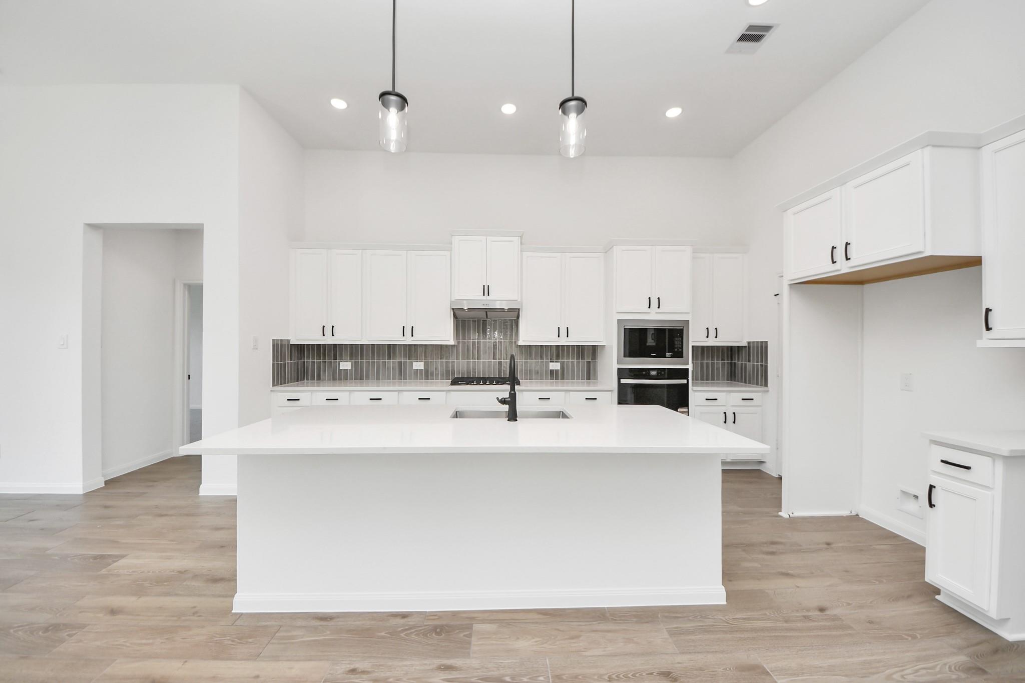 7715 Pale Petunia Trail