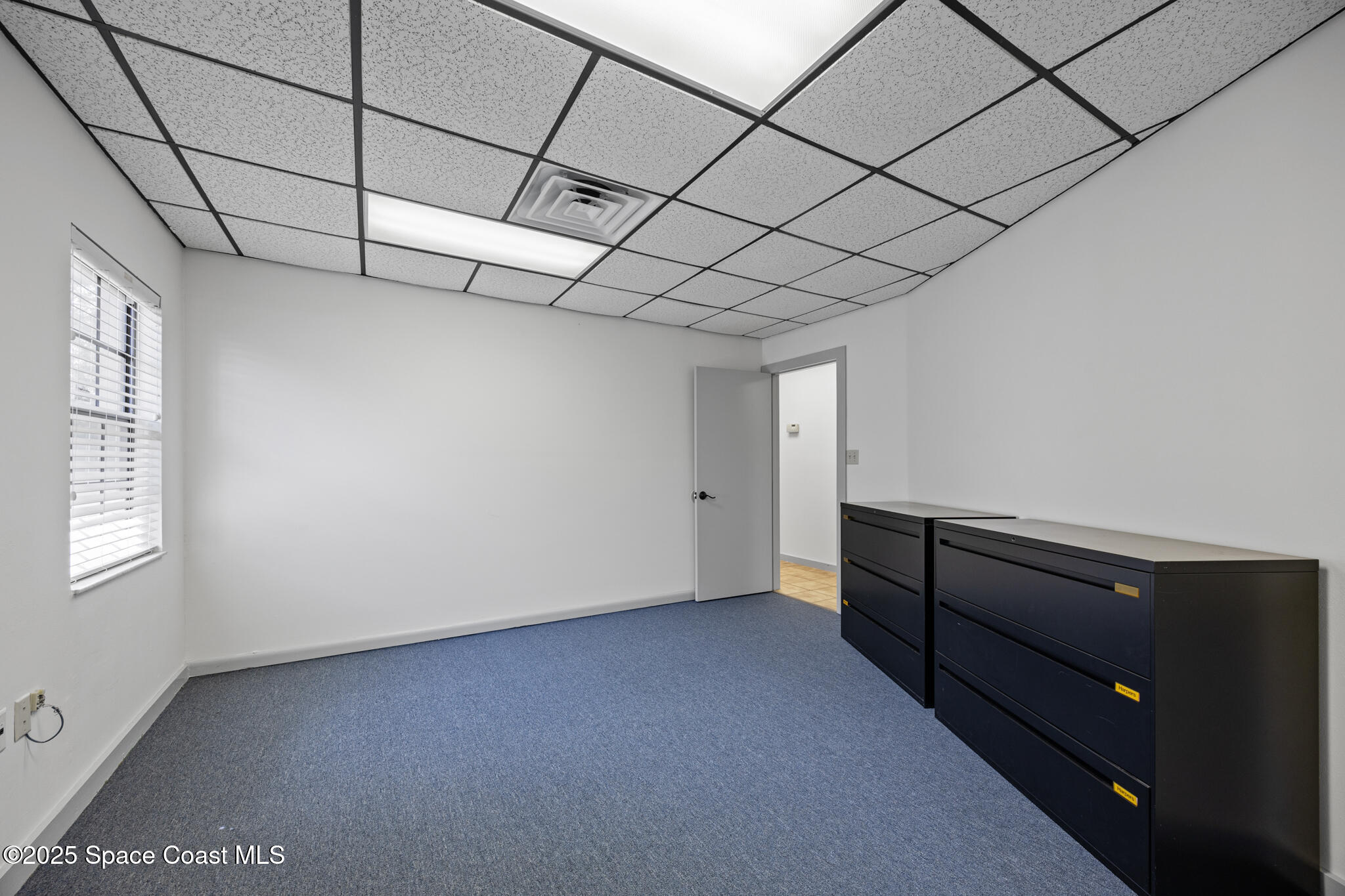 2255 N Courtenay Parkway, 1