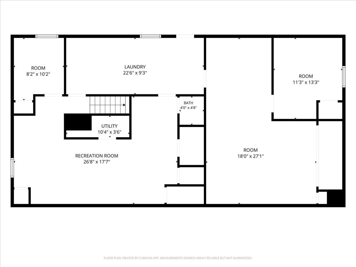 Floor plan showing a recreation room, laundry, utility area, bath, and three rooms with dimensions.