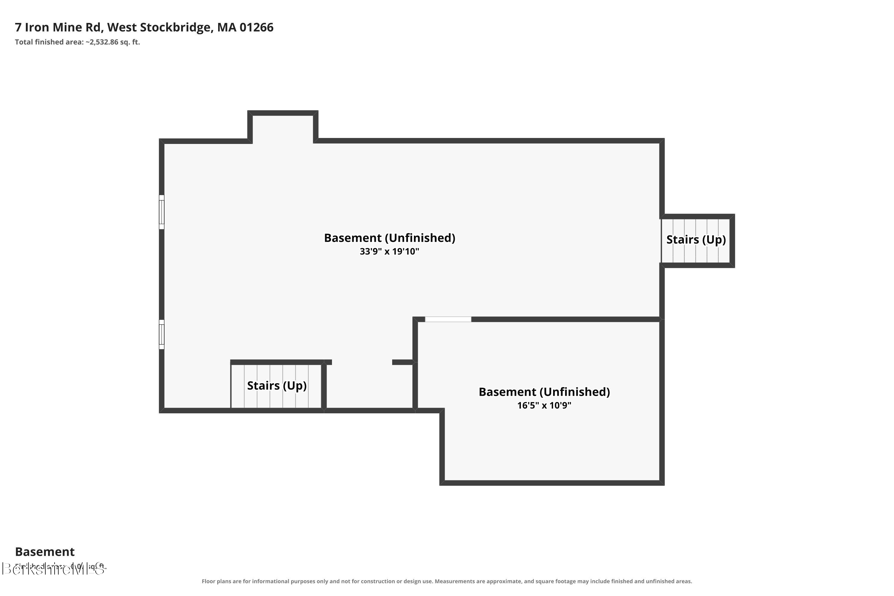 Basement floor plan with two unfinished areas, dimensions, and two stairways leading up.