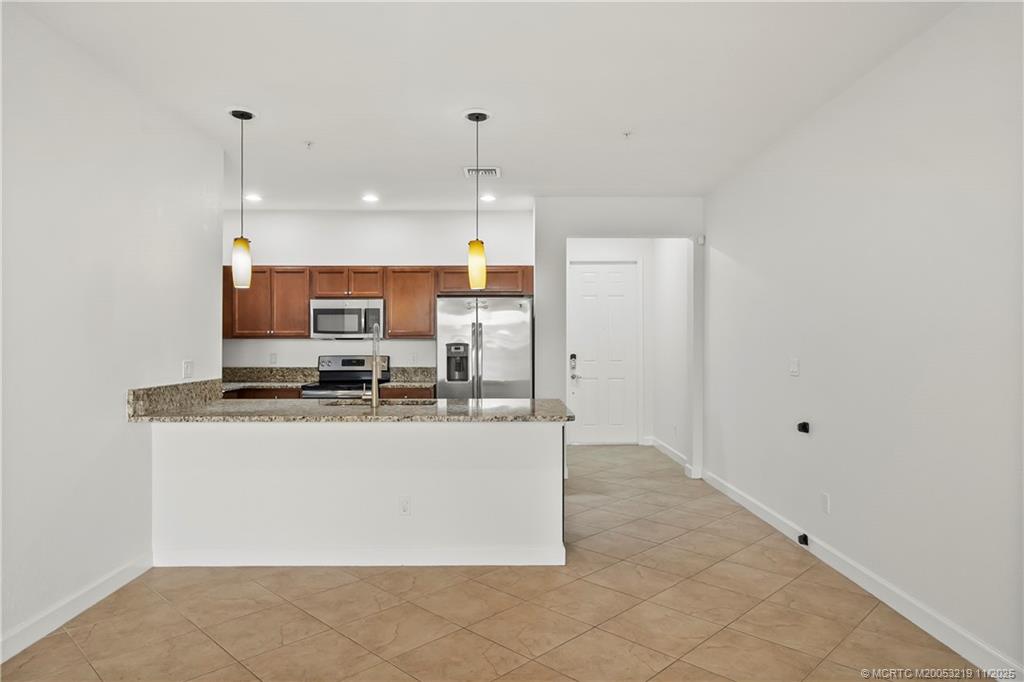 9512 SW Merlin Ct