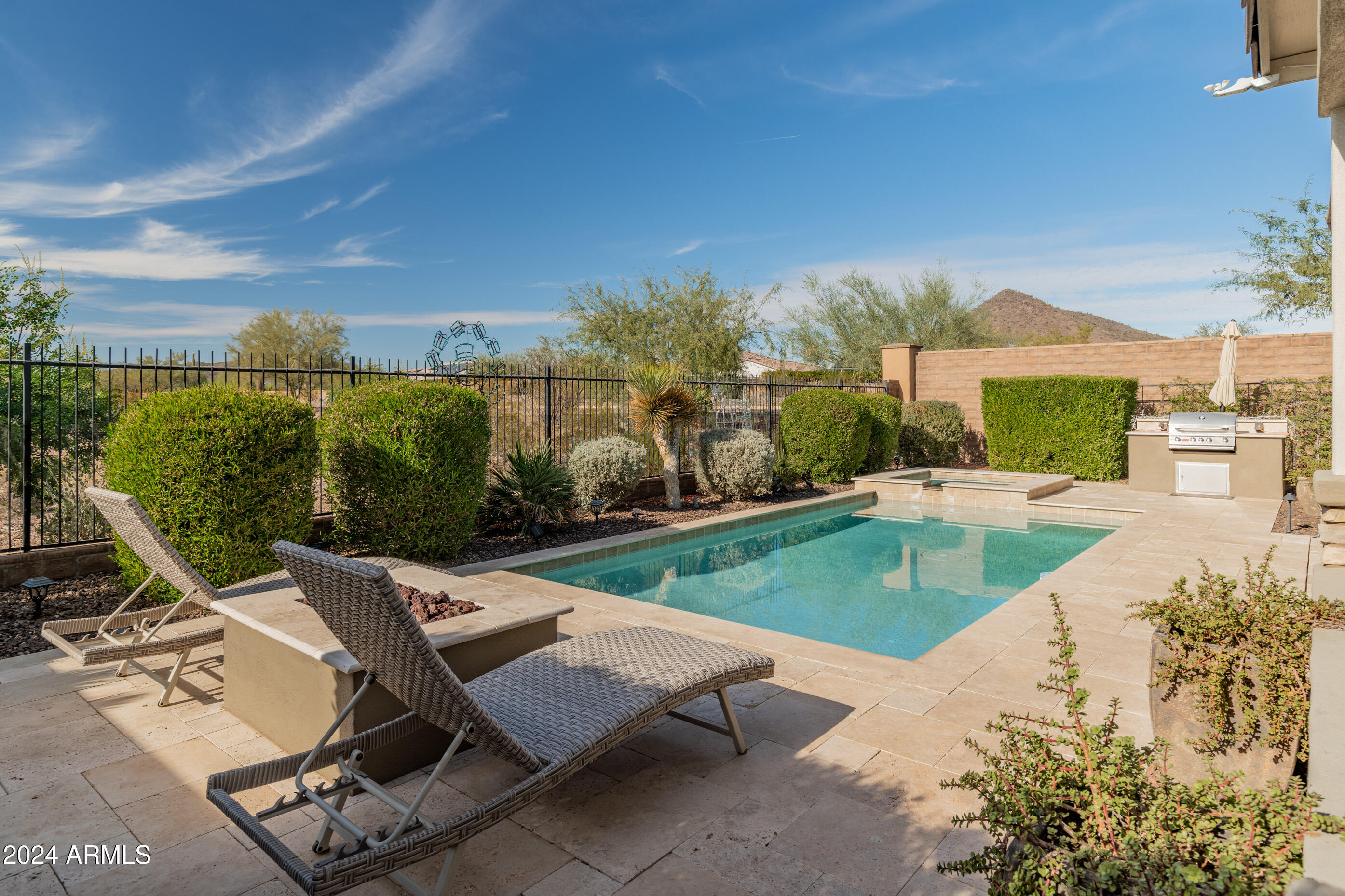 12487 W GILIA Way