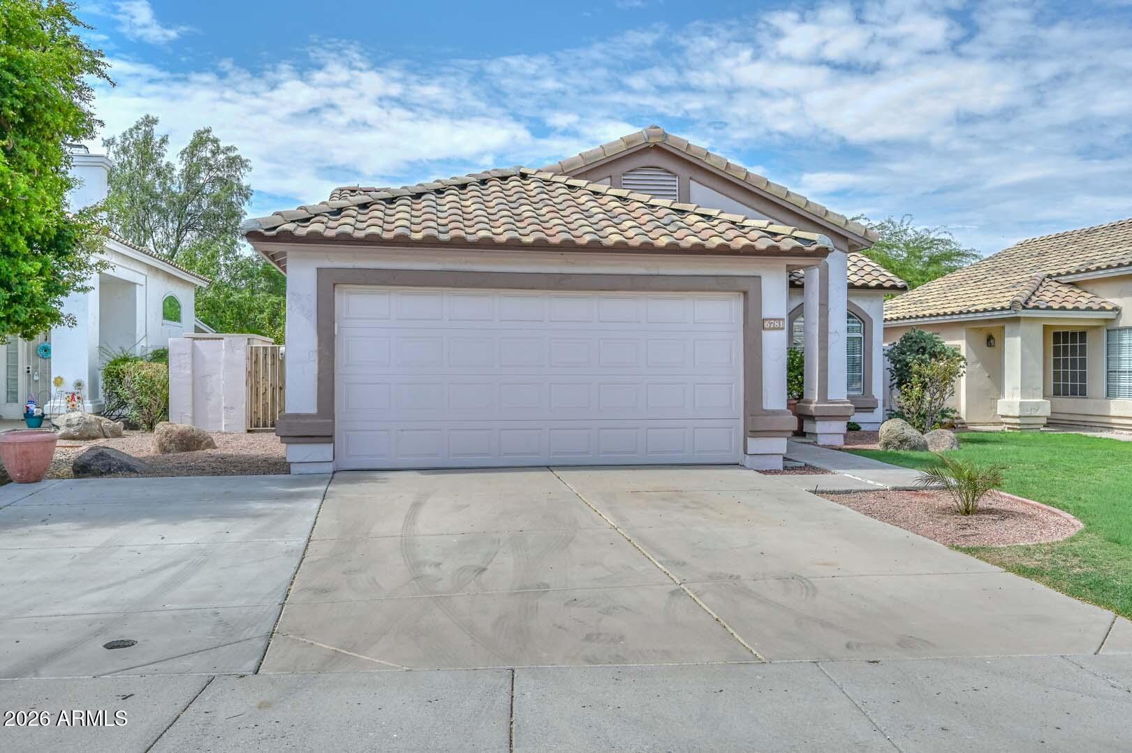 6781 W LOUISE Drive