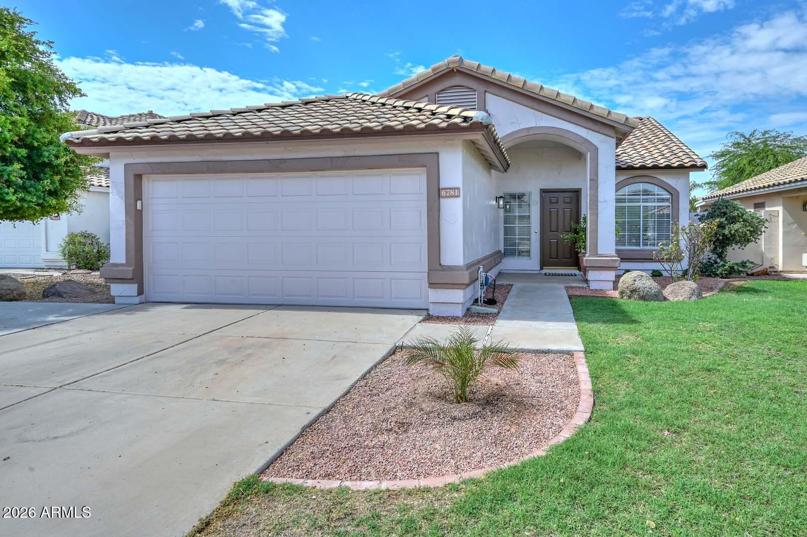 6781 W LOUISE Drive