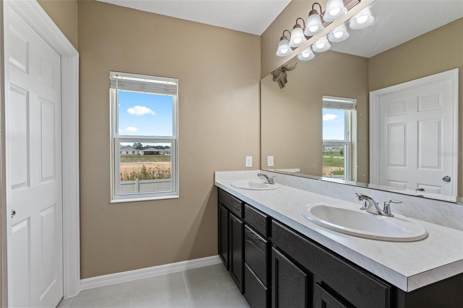 5515 WINDSONG OAK DR