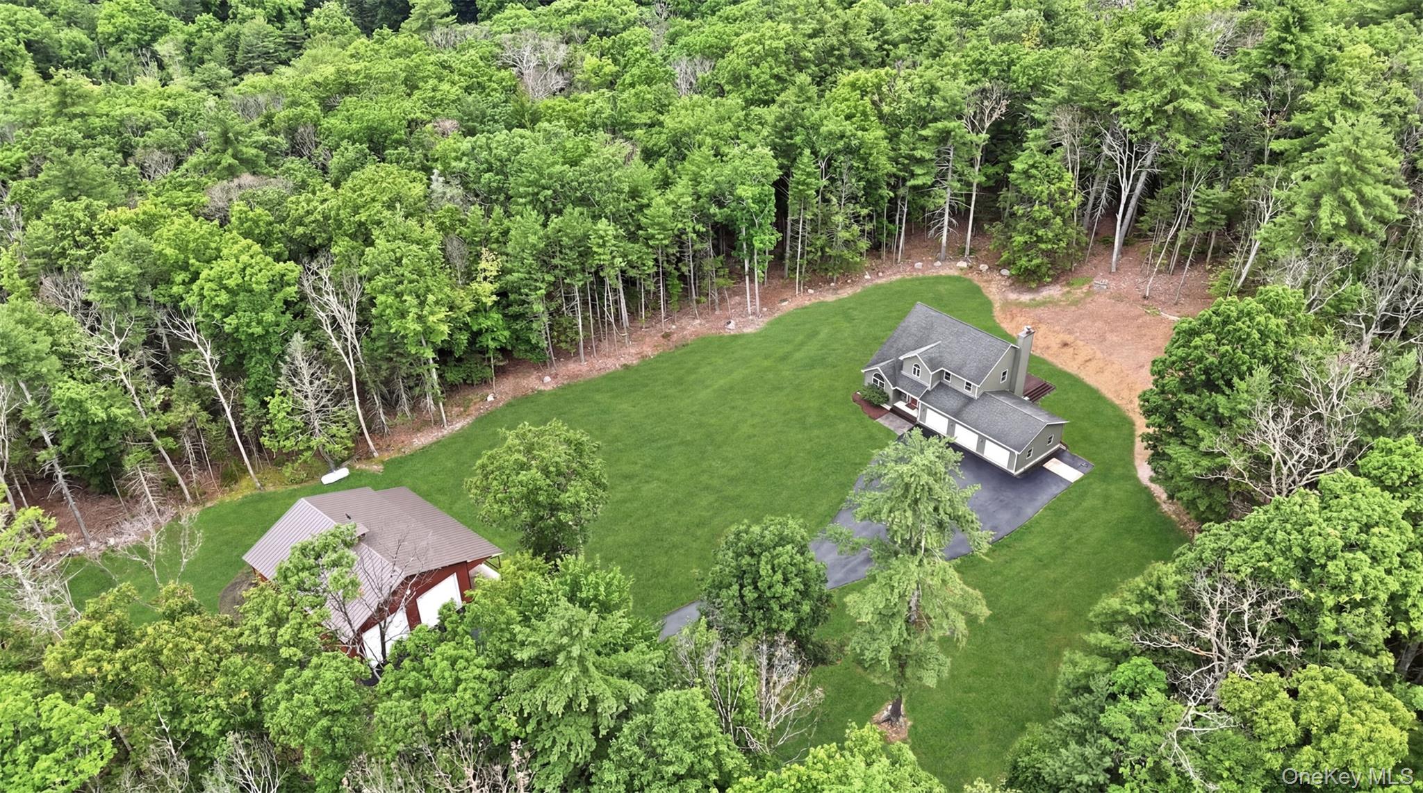 Secluded Colonial with Ample Garage